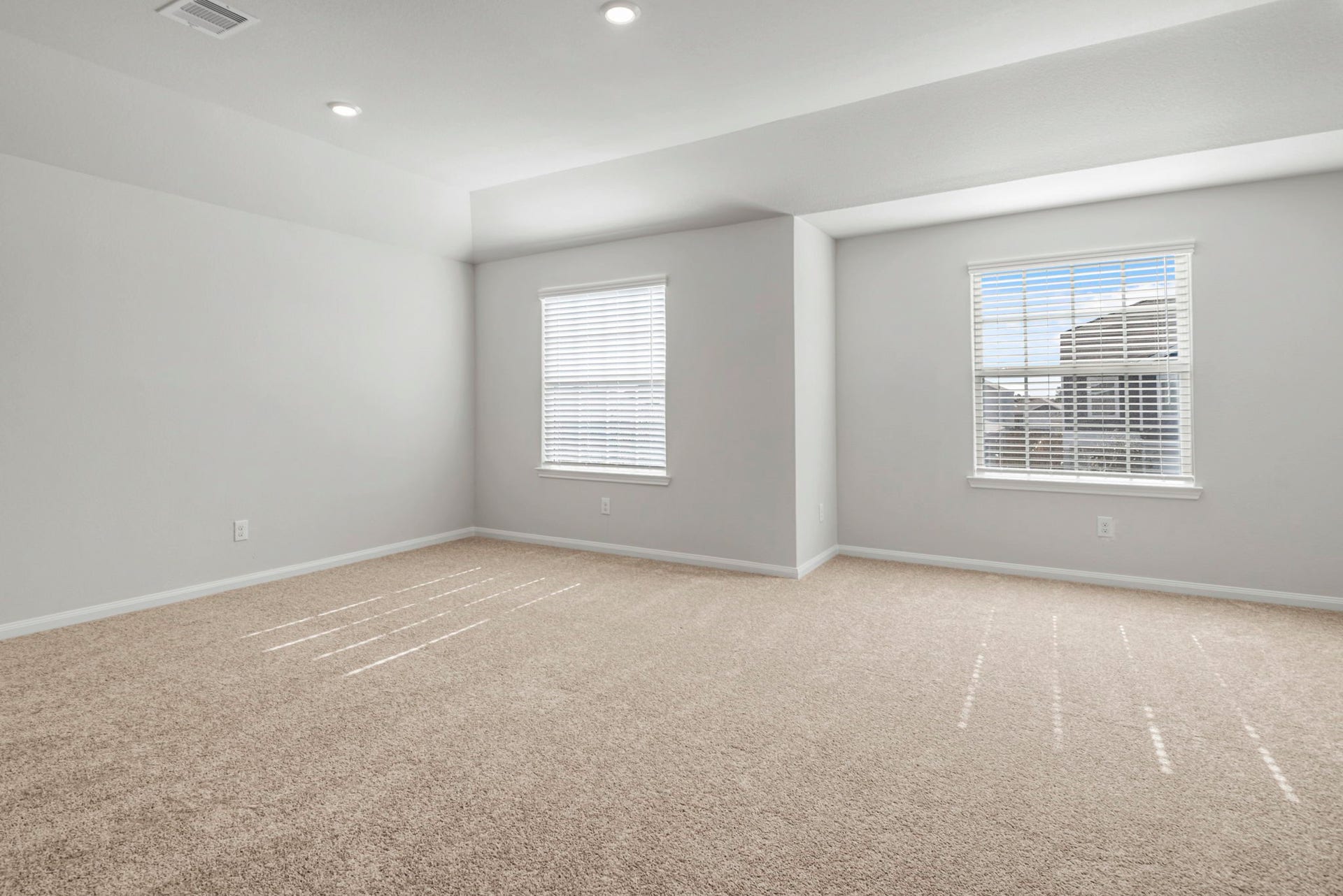 6418 Winter Elm Street, Houston, TX 77048 The large, primary bedroom with beautiful windows.