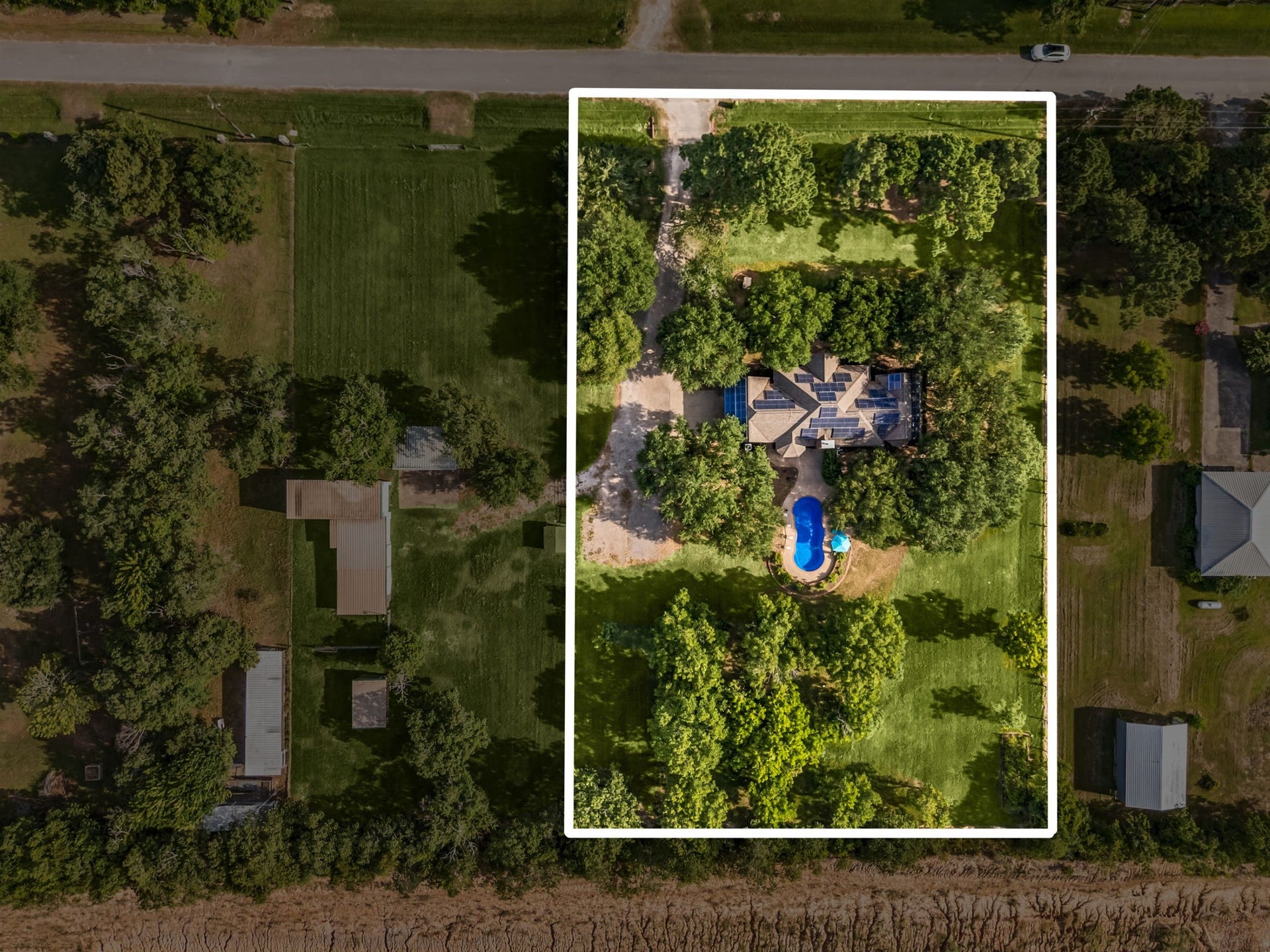 28310 Rose Lane, Katy, TX 77494 Enjoy the freedom of over 2 unrestricted acres featuring sprawling green space, mature shade trees, lush landscaping, and endless opportunities to create your own private retreat.