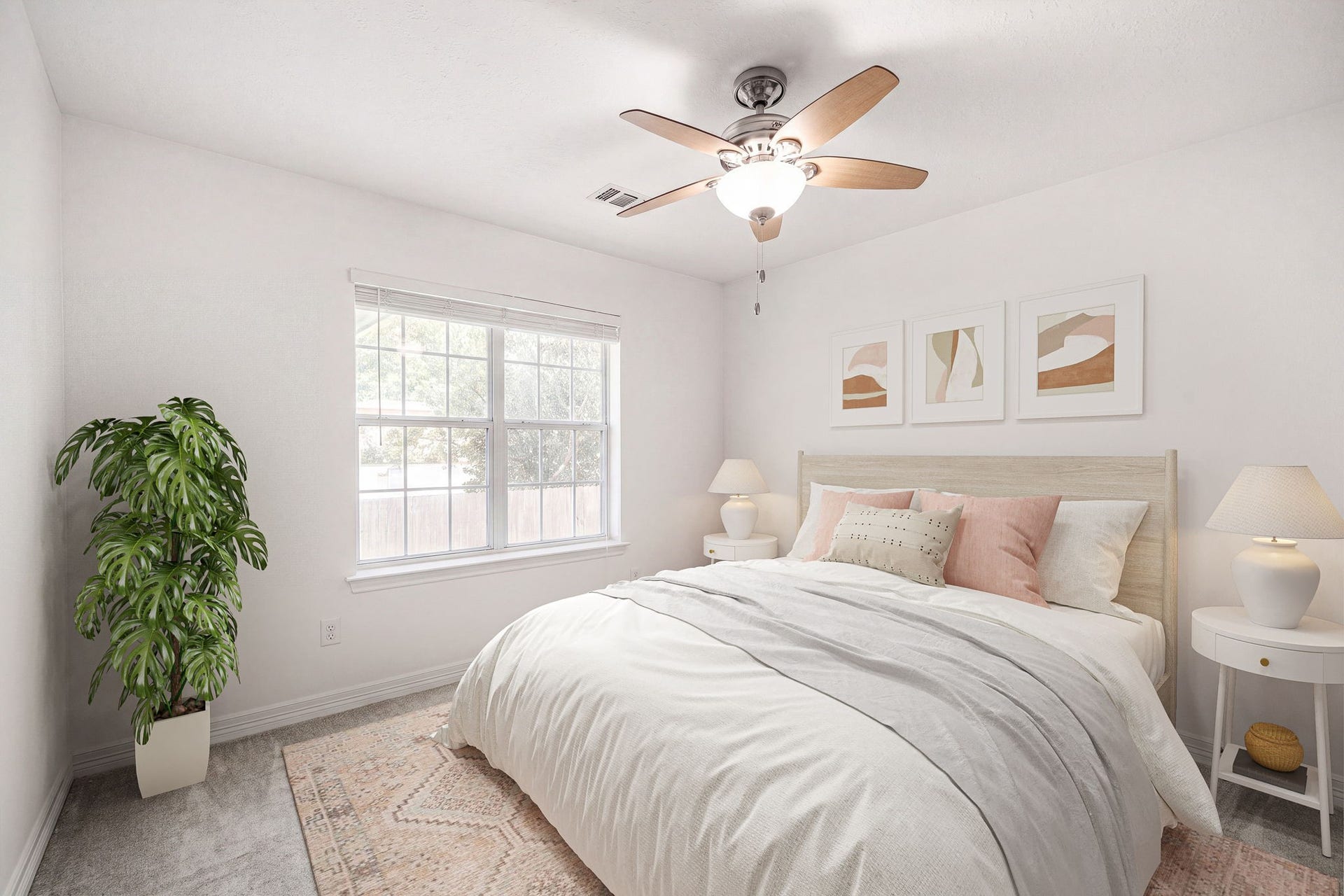 28310 Rose Lane, Katy, TX 77494 Bright and inviting secondary bedroom offering a neutral color palette, plush carpeting, and crisp white trim. A large multi-pane window fills the room with abundant natural light and provides peaceful views of the outdoors. The well-proportioned space features a classic central ceiling fan with an integrated light fixture, creating a highly functional layout perfect for family or guests.