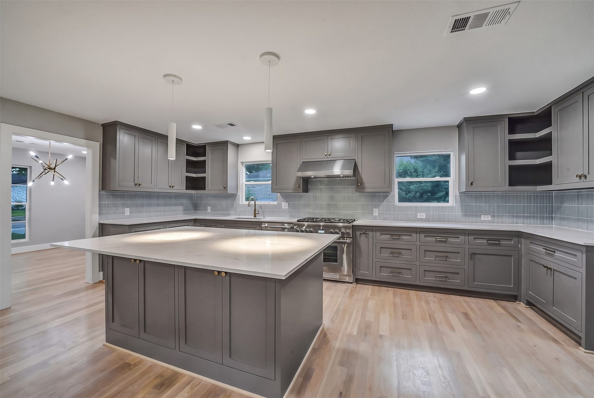 5318 Queensloch Drive, Houston, TX 77096 Another shot of the wonderful kitchen. Sleek cabinetry offering ample storage, plus all appliances brand new!