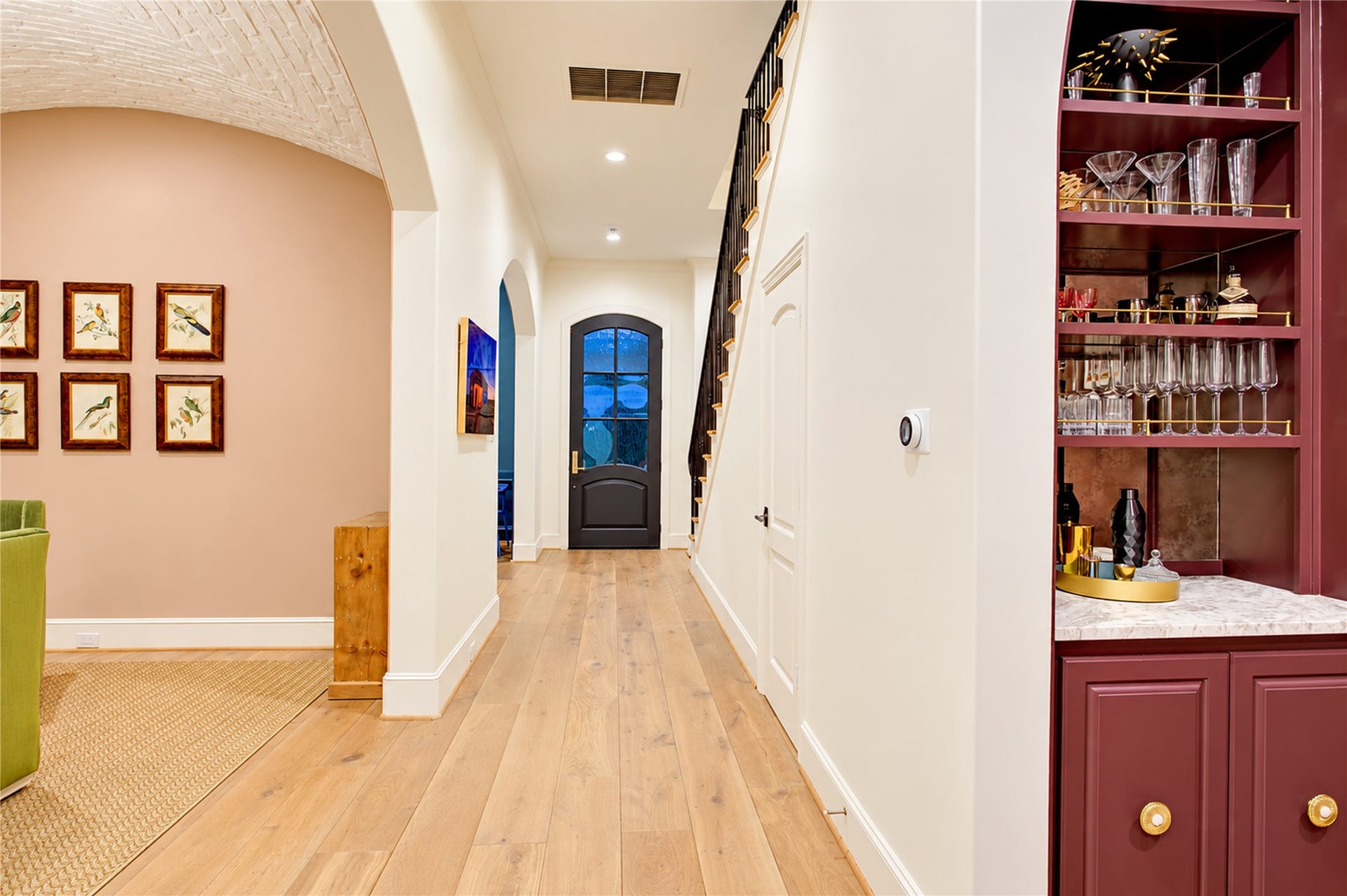 2215 North Boulevard, Houston, TX 77098 Soaring ceilings and graceful arched openings create an elegant introduction to this distinguished residence.