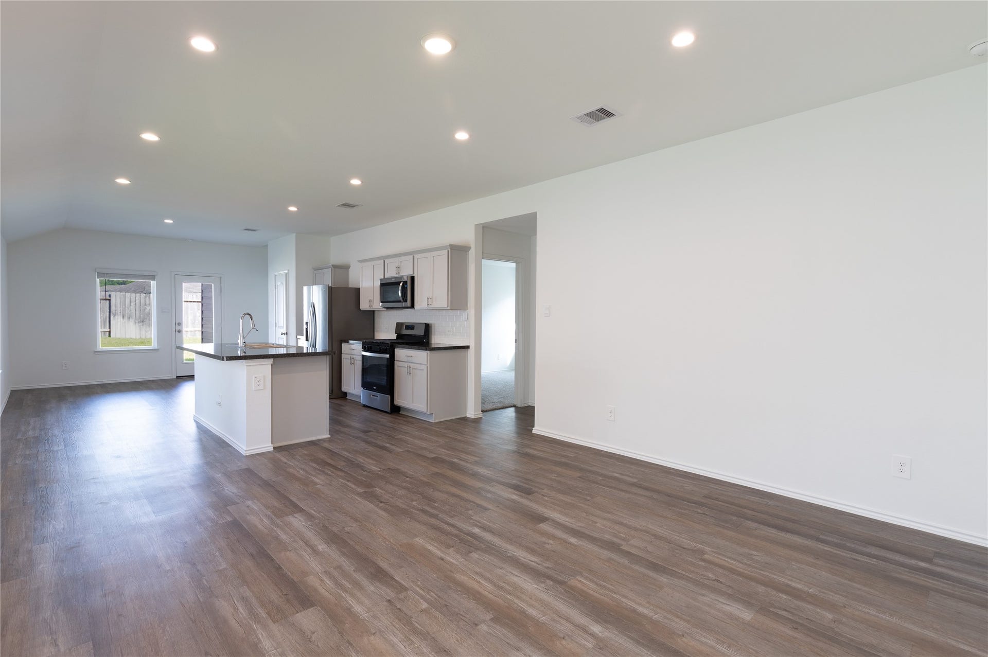 24330 Saddlestone Green Drive, Spring, TX 77373 The entryway creates a cozy welcome