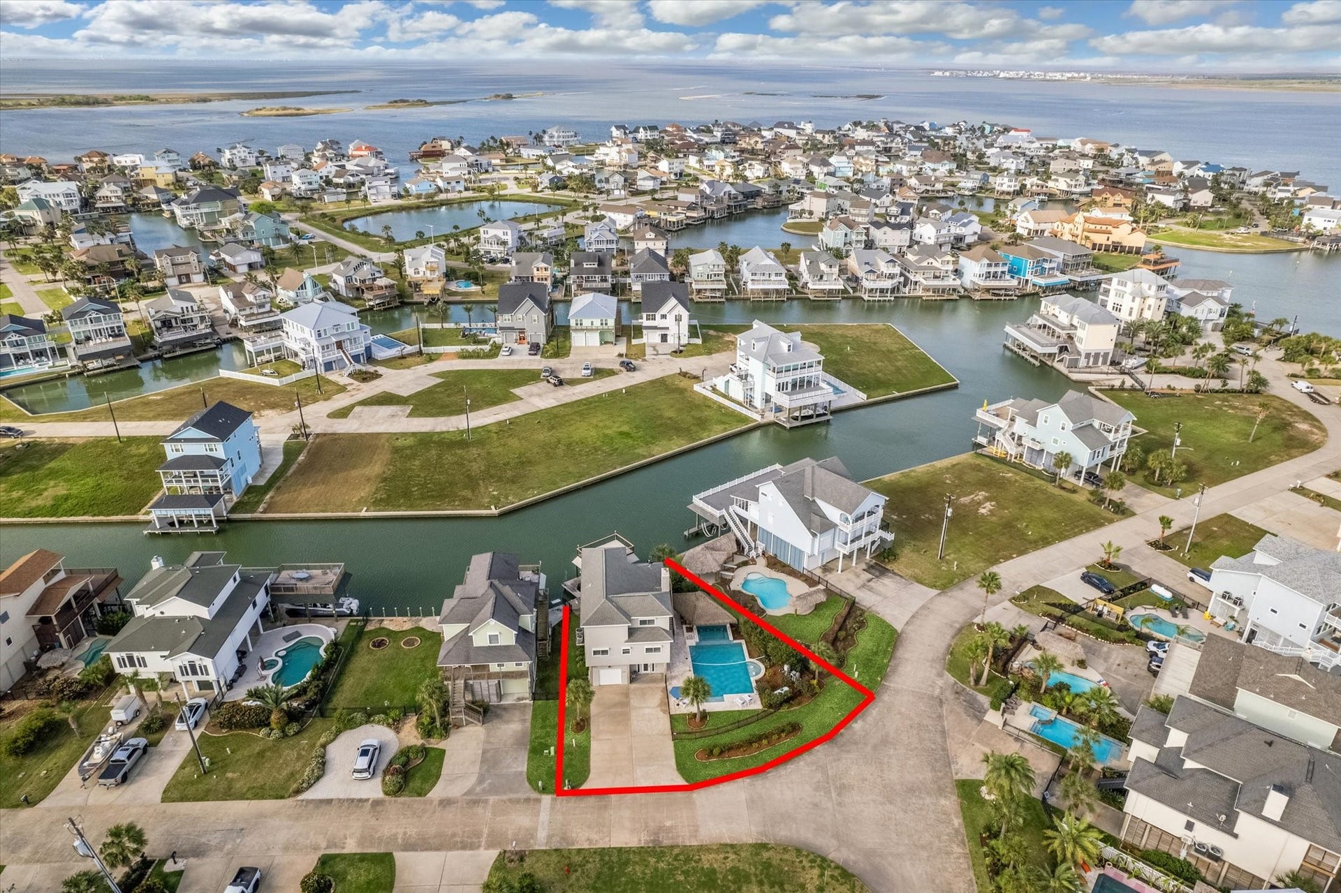 519 Westerly Drive, Tiki Island, TX 77554 Positioned on a canal, offering beautiful water views and easy access to nearby amenities. Ideal for those seeking a serene, coastal lifestyle!