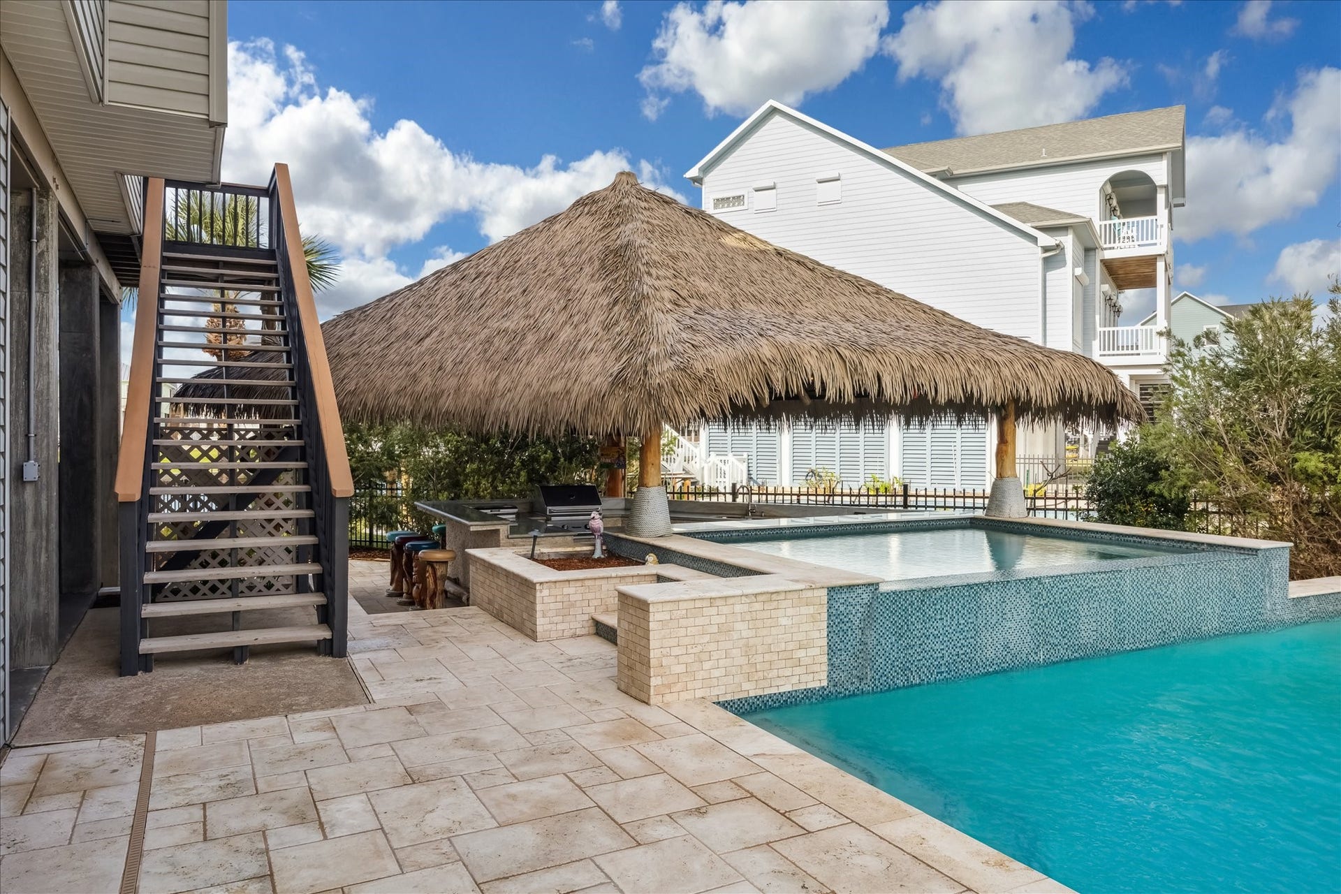 519 Westerly Drive, Tiki Island, TX 77554 Ideal for enjoying sunny days in a tropical-style setting. Palapa top is synthetic with 20 year warranty.