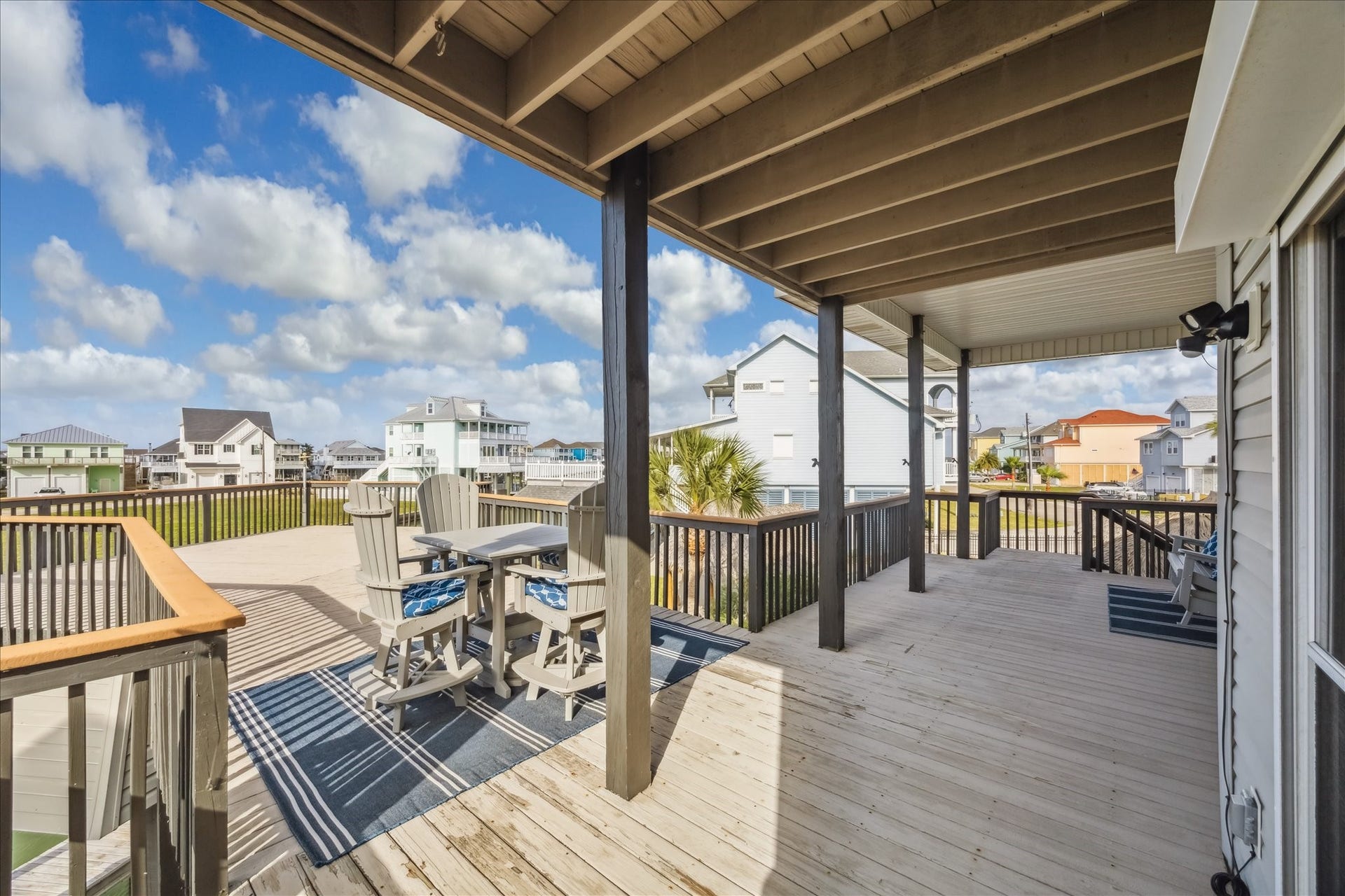 519 Westerly Drive, Tiki Island, TX 77554 Covered deck, perfect for outdoor dining and relaxation.