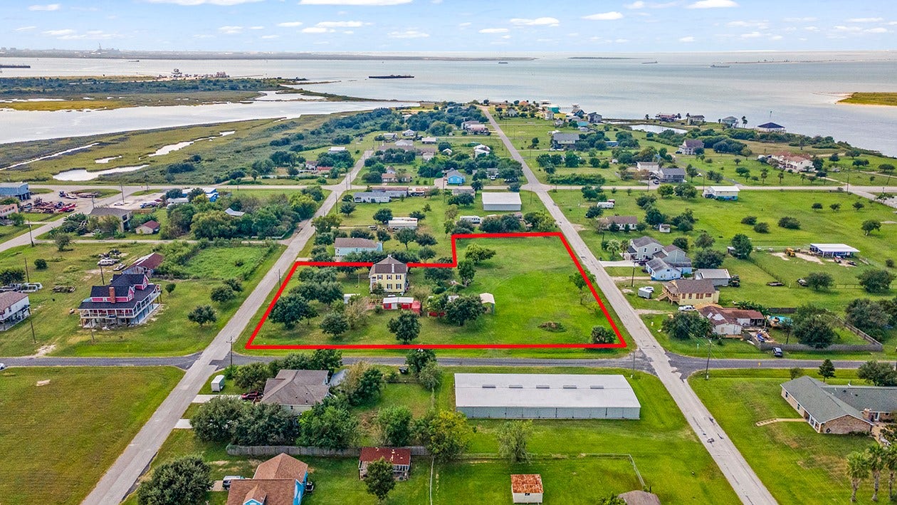 813 Nelson Avenue, Port Bolivar, TX 77650 The Home Lot with adjacent 3 lots totaling 1.6 acres