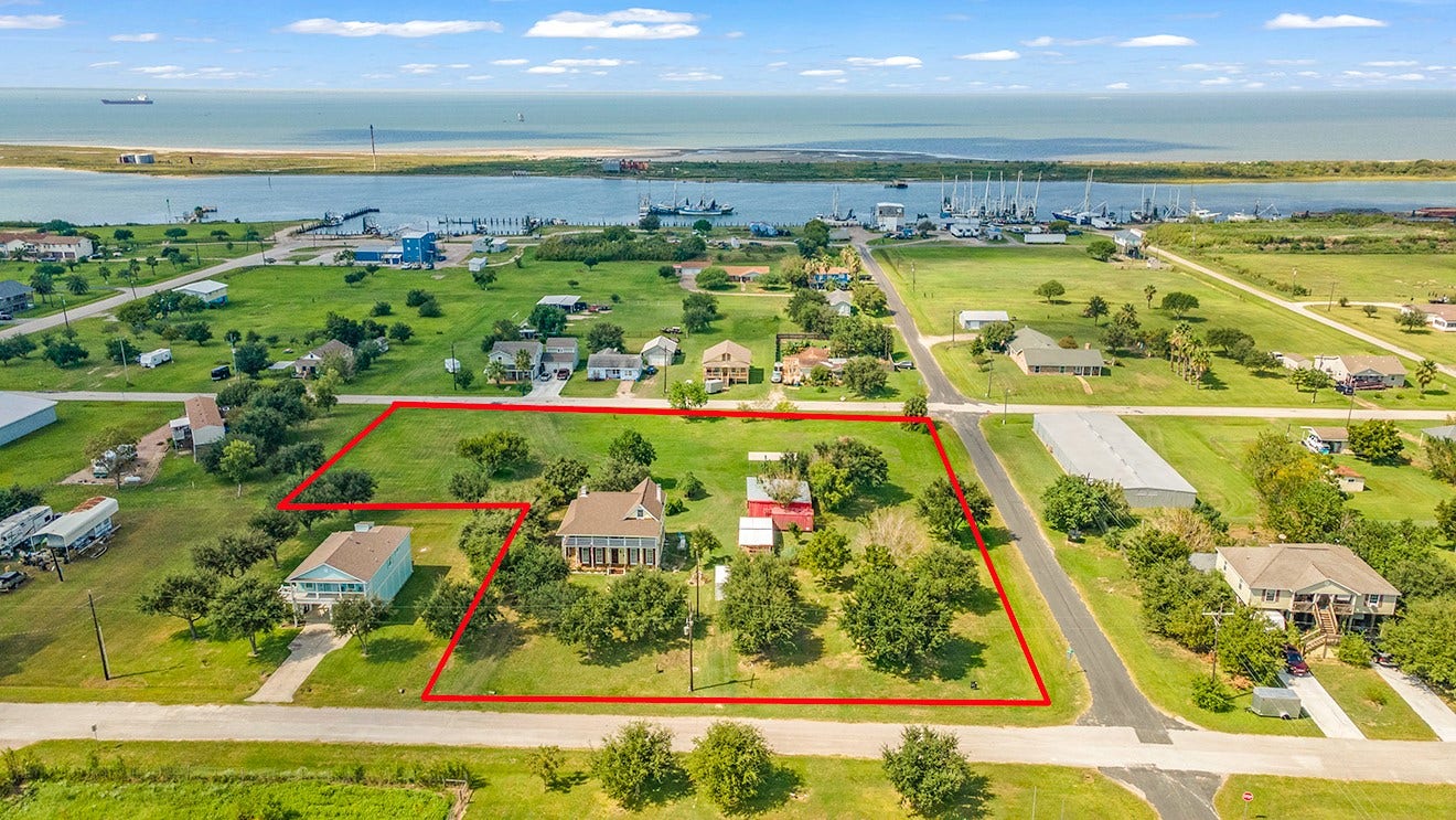 813 Nelson Avenue, Port Bolivar, TX 77650 The Home Lot with adjacent 3 lots totaling 1.6 acres