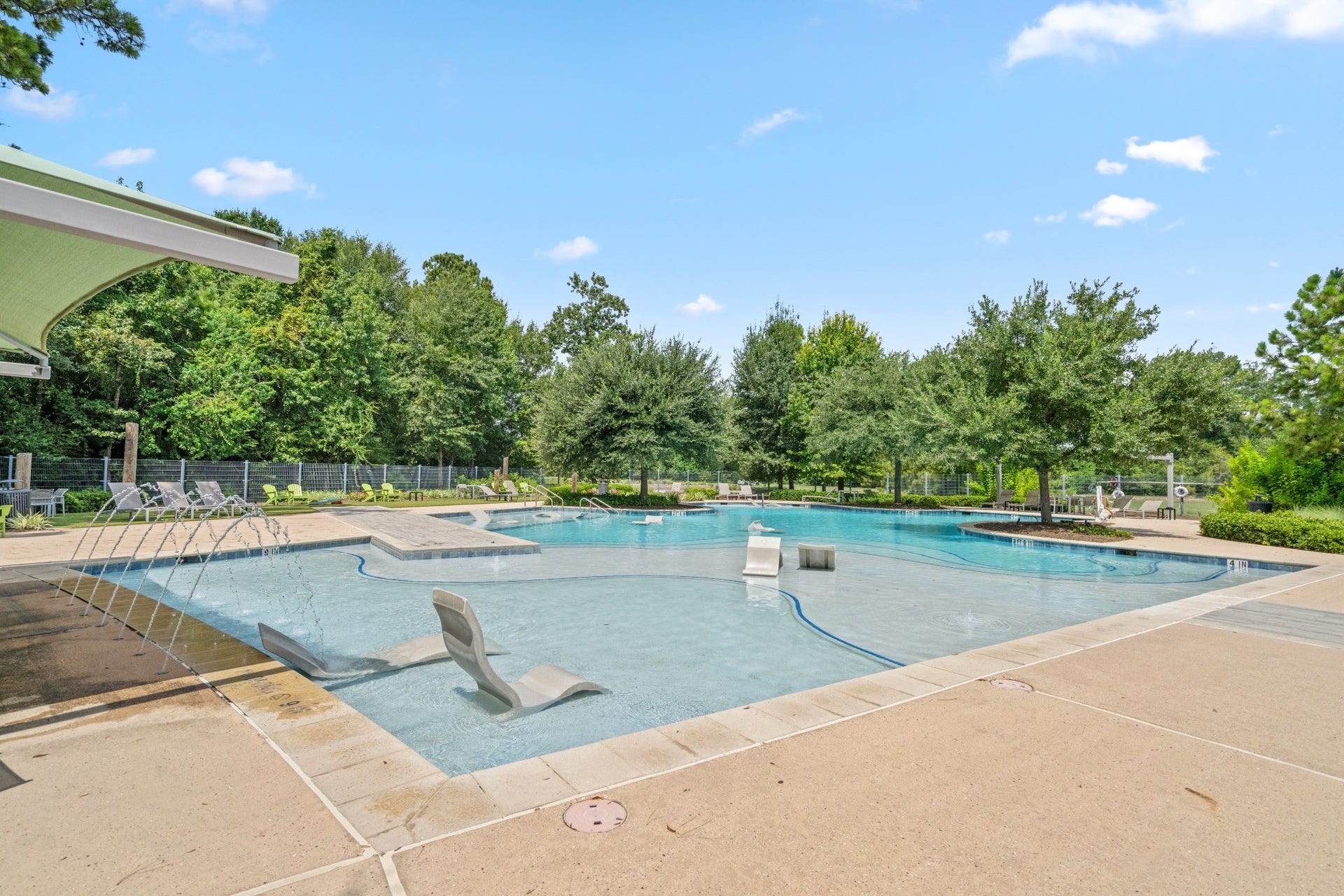 16955 Chapel Knox Drive, Humble, TX 77346 The Groves community swimming pool with resort-style recreation and family-friendly outdoor space.