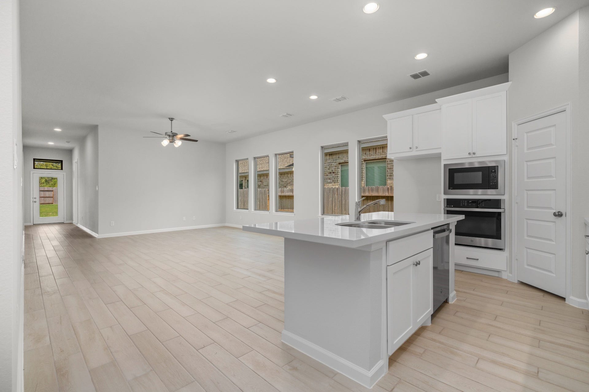 16955 Chapel Knox Drive, Humble, TX 77346 Open kitchen and living layout designed for everyday living and entertaining.