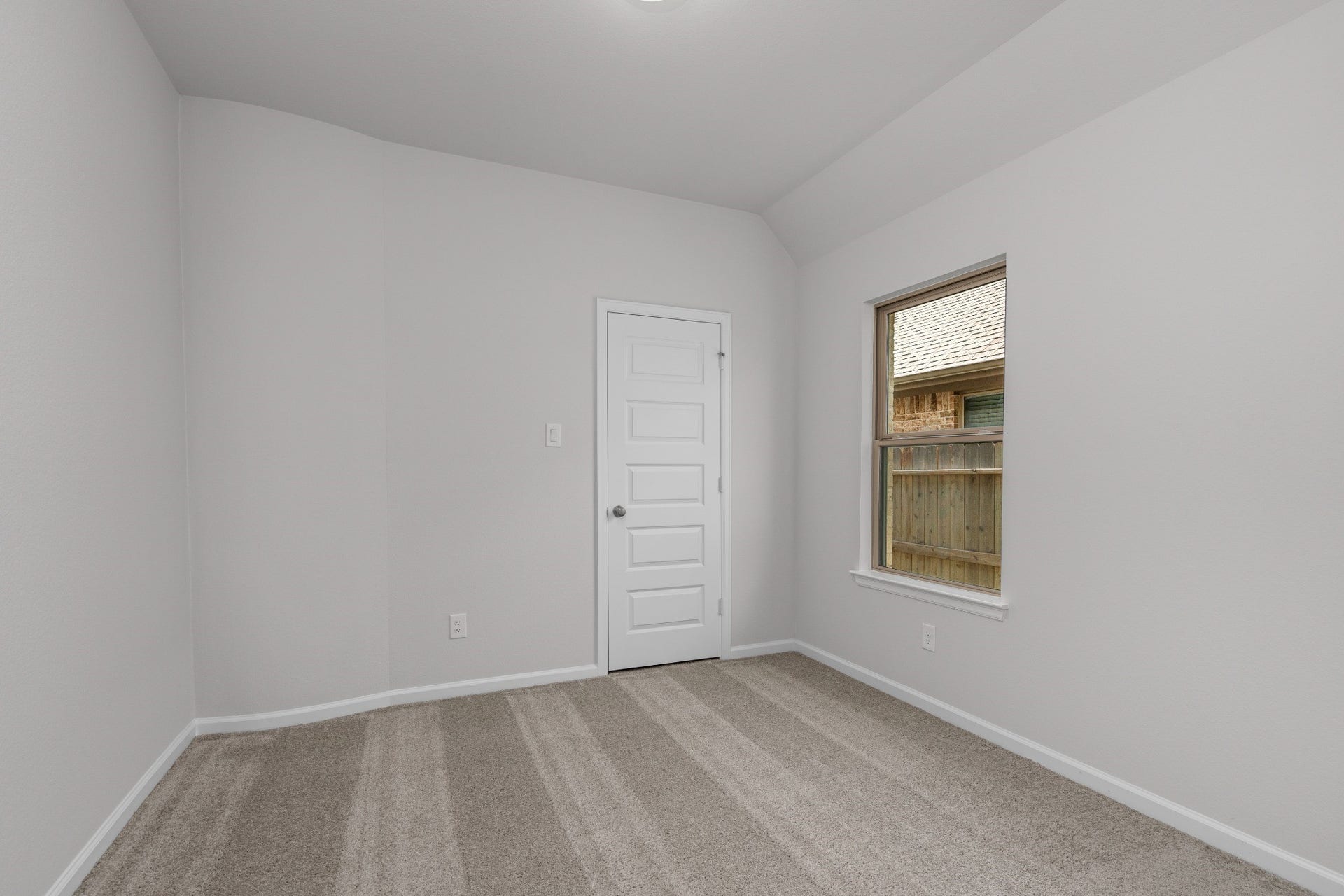 16955 Chapel Knox Drive, Humble, TX 77346 Secondary bedroom with neutral carpet, high ceiling and natural light.