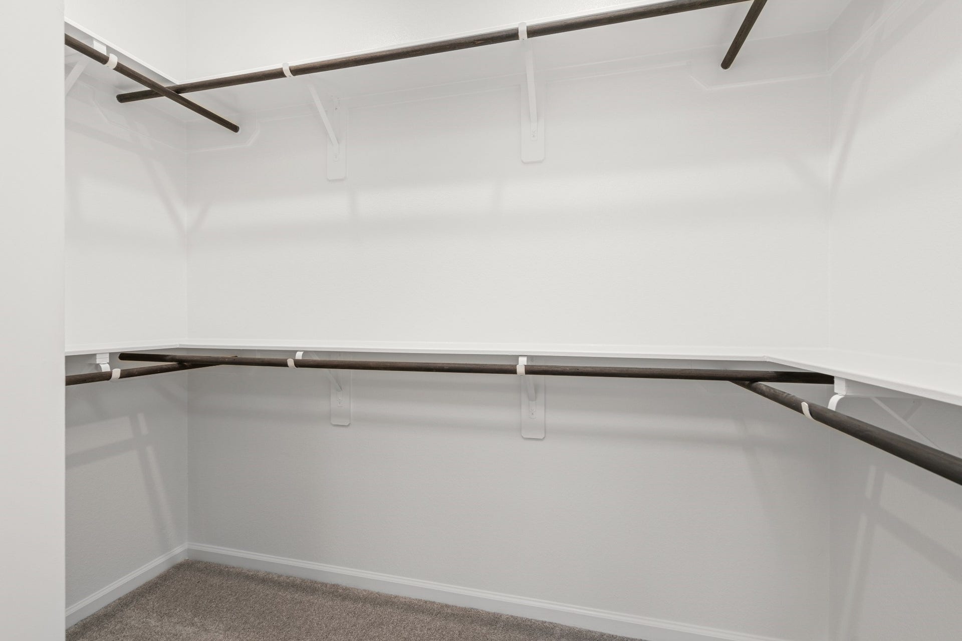 16955 Chapel Knox Drive, Humble, TX 77346 Spacious primary walk-in closet with multiple hanging areas and shelving.