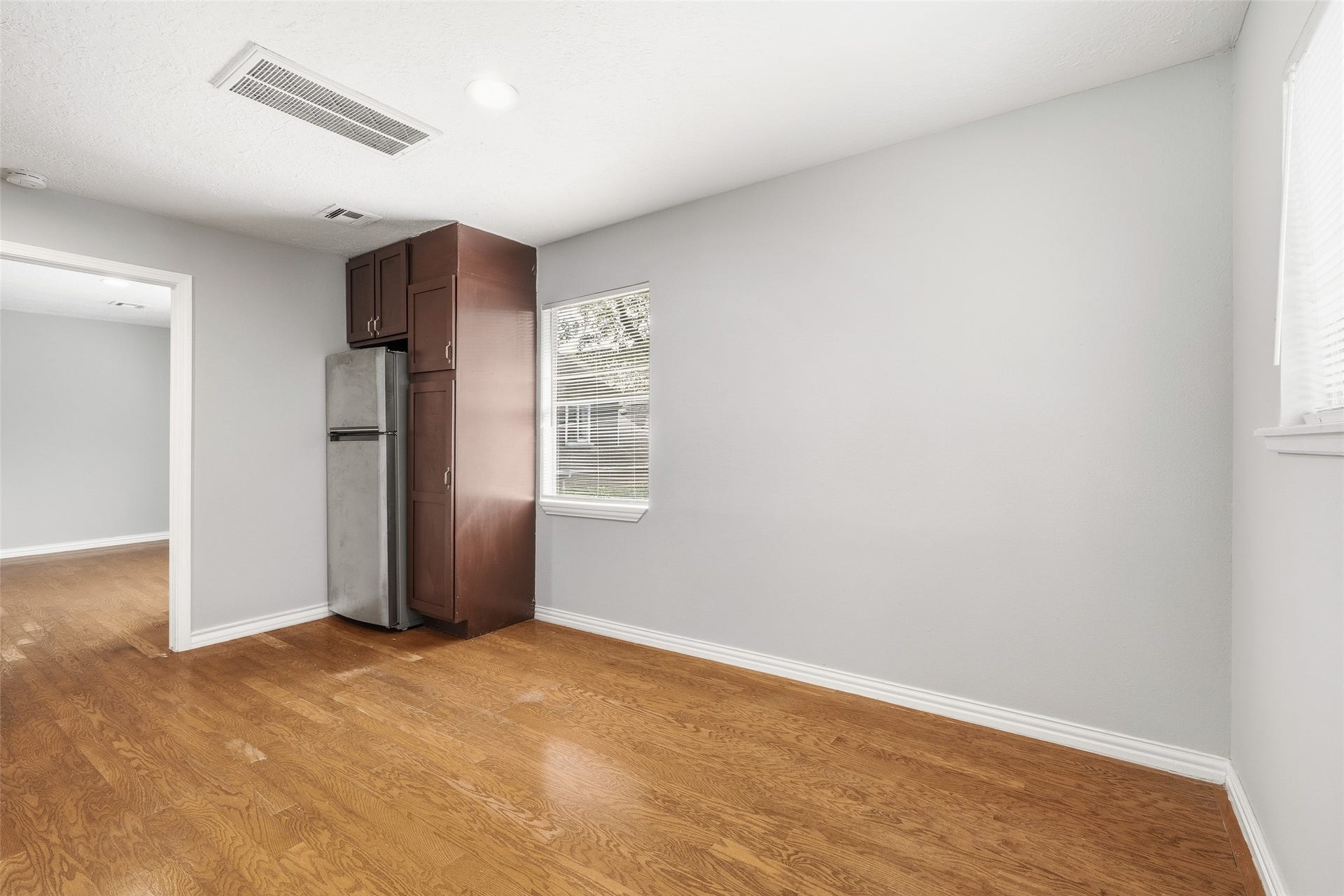 Garage apartment featuring two bedrooms, a bathroom and mini-kitchen, ideal for multi-generational living.