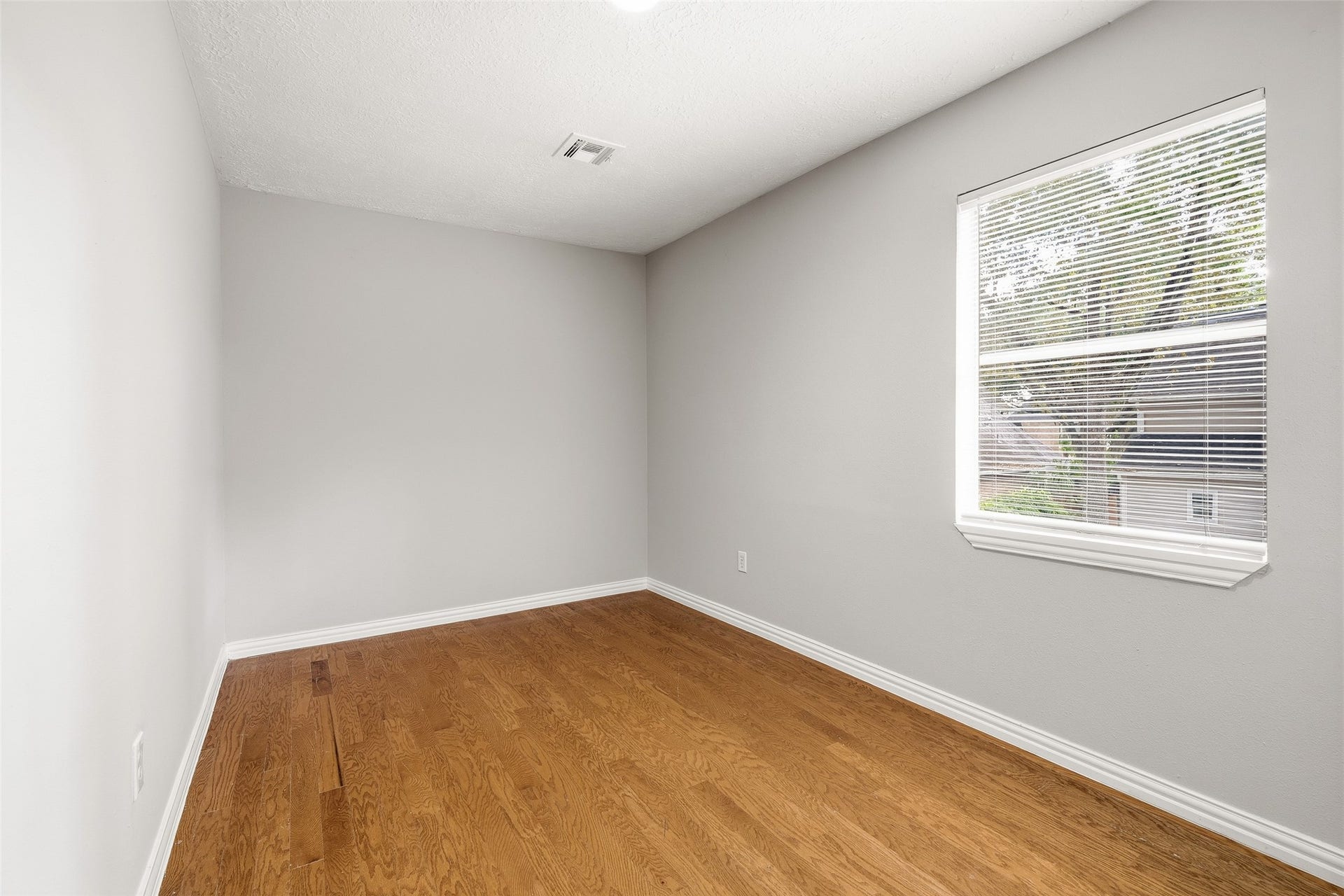 Garage apartment features separate access offering flexibility for renters or multi-generational living.