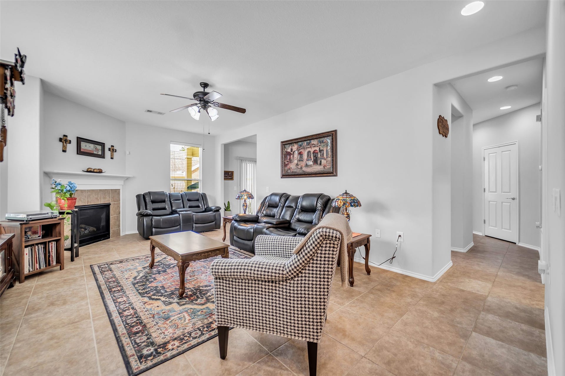 13600 Breton Ridge Street, #20A, Houston, TX 77070 Beautiful tile flooring, fireplace in living room.
