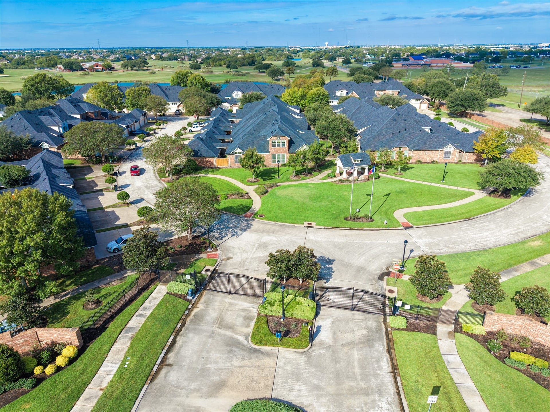 View of the entrance gates to this community.