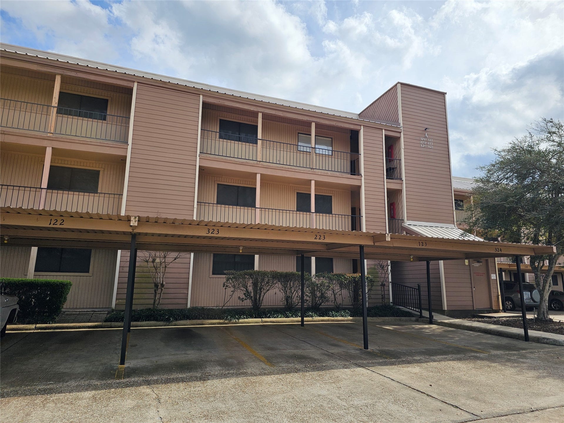15575 Marina Drive, #323A, Conroe, TX 77356 Views from the parking spot to the elevator. Just a short walk.