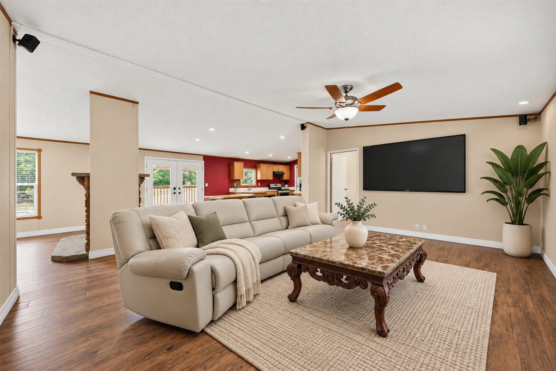 2581 Mann Road, Conroe, TX 77303 Virtually staged living area highlighting the generous layout and possibilities for gathering and everyday living.