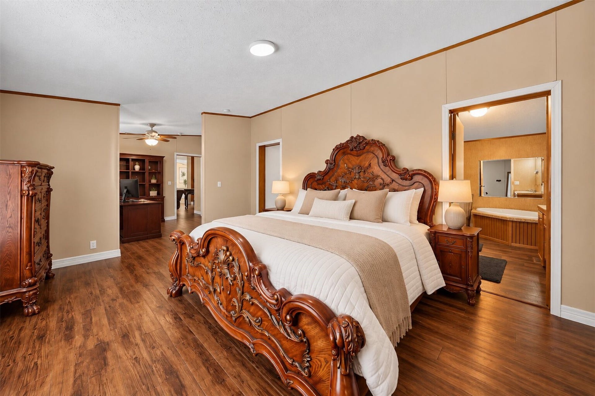 2581 Mann Road, Conroe, TX 77303 Virtually staged bedroom highlighting its generous size and flexible layout.