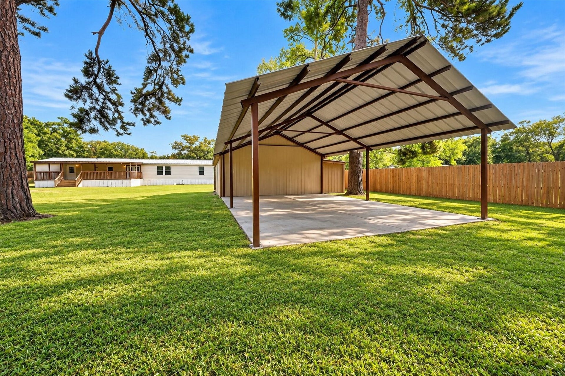 2581 Mann Road, Conroe, TX 77303 Covered outdoor pavilion creates an additional space for gatherings, dining, or relaxing outdoors.
