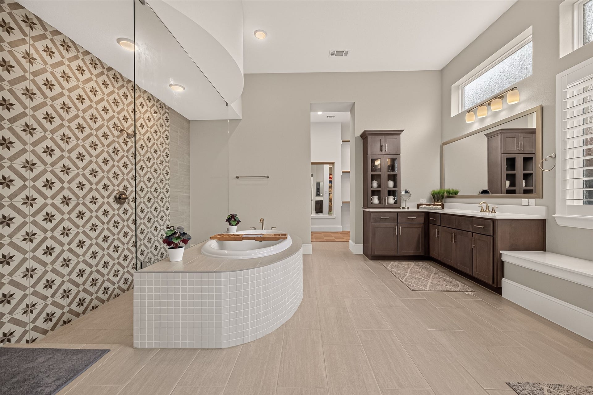 11219 Elm Creek Falls Court, Cypress, TX 77433 Primary bathroom features dual vanities, soaking tub and a very spacious shower!