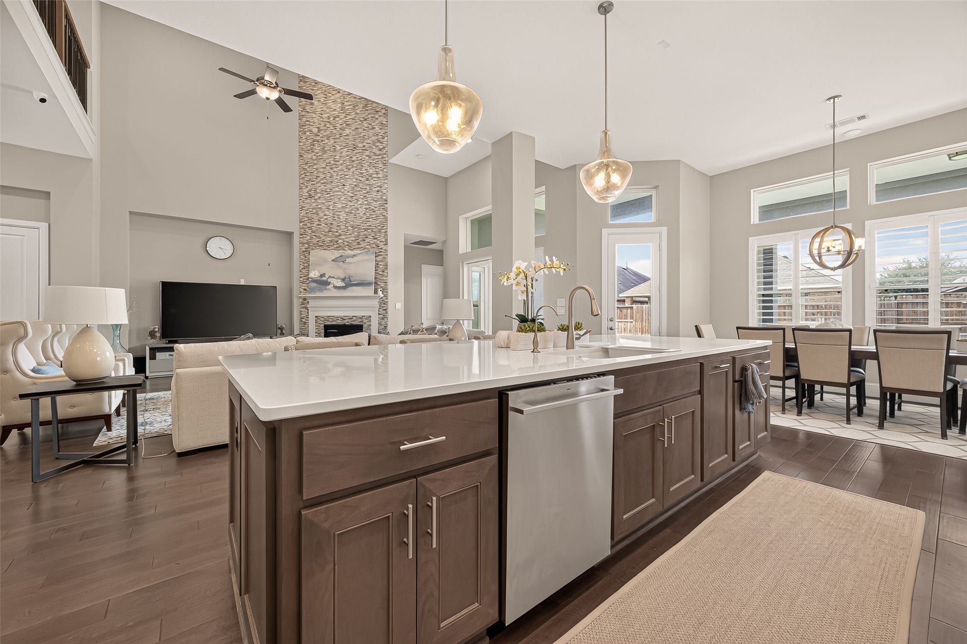 11219 Elm Creek Falls Court, Cypress, TX 77433 Gourmet kitchen featuring elegant quartz countertops and top-of-the-line appliances, perfect for everyday cooking and entertaining.