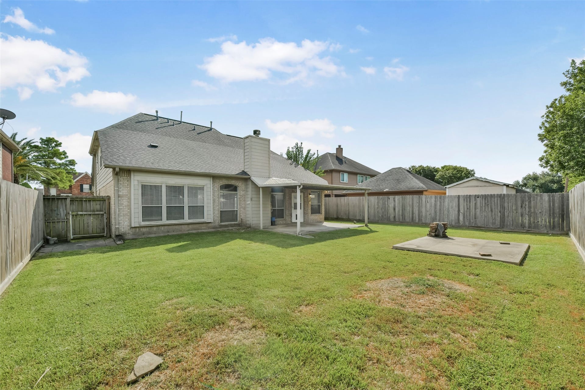 11003 Pinewood Court, La Porte, TX 77571 View of backyard and back of home
