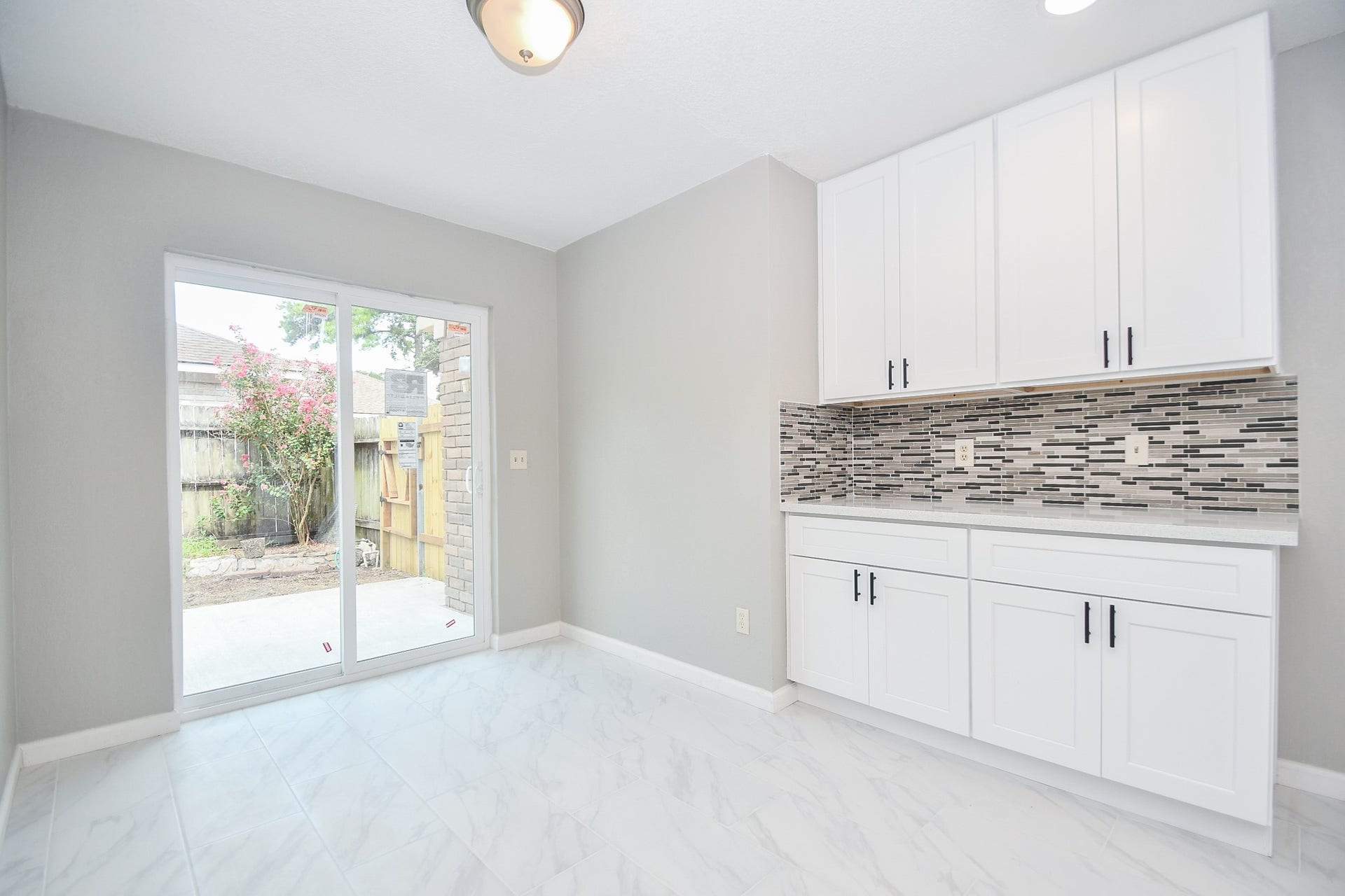 21707 Park Valley Drive, Katy, TX 77450 sliding doors from kitchen to side patio