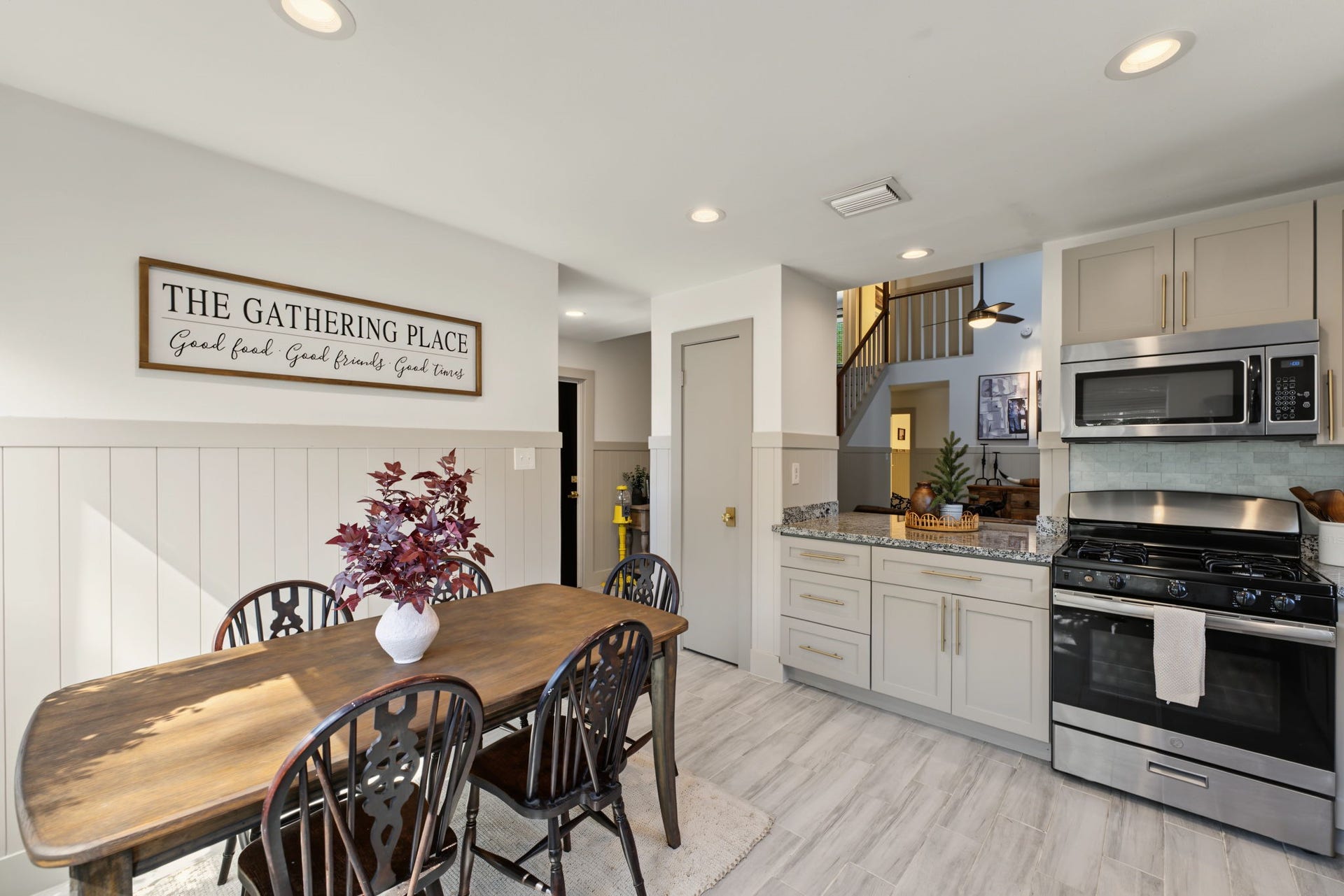 5006 Deer Point Drive, Spring, TX 77389 Sunny breakfast nook is lined with windows and shiplap wainscoting, the perfect spot for your morning coffee!