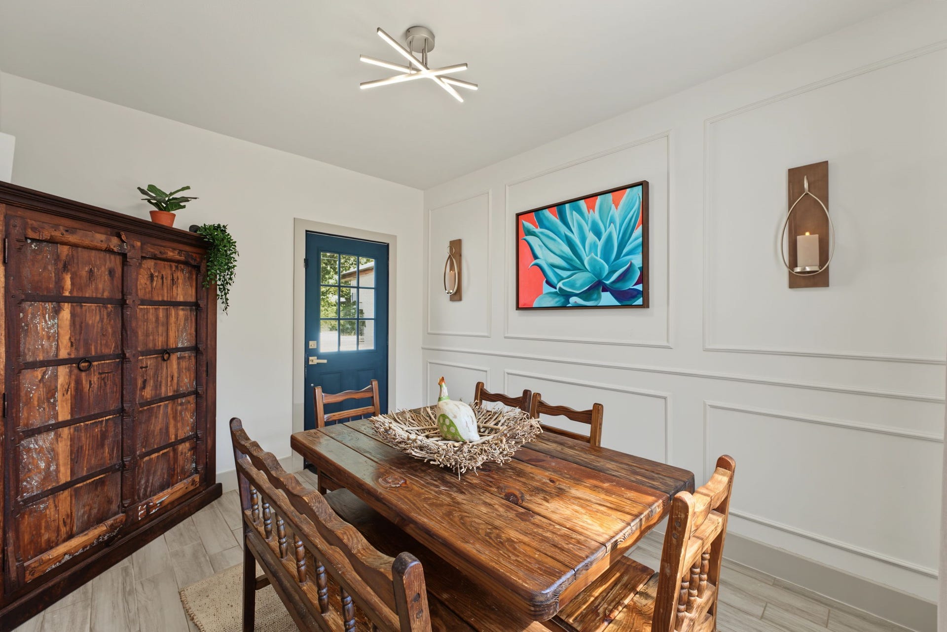 5006 Deer Point Drive, Spring, TX 77389 Flex room with French doors, picture-frame molding and a modern light fixture opens to the deck and pool! Use it as a dining room, game room or home office.