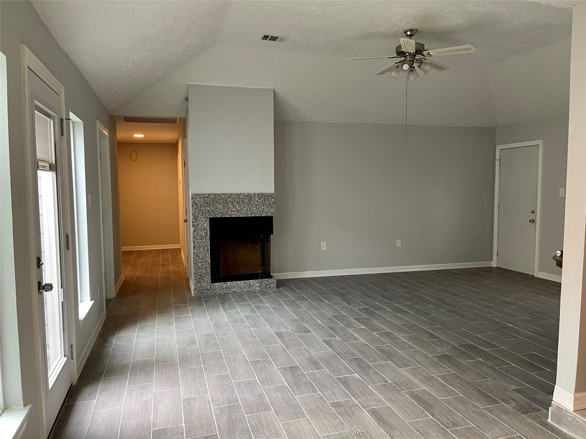 9415 Westacre Place, Houston, TX 77083 Large Family room with fire place
