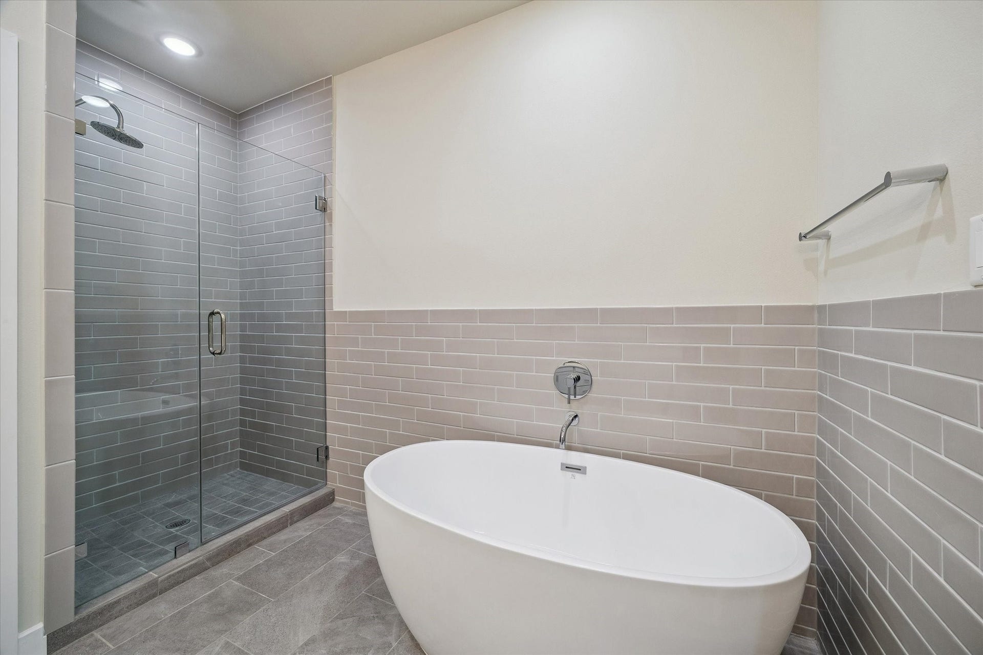 6342 Paddington Bend Drive, Houston, TX 77008 Representative photo showing the communitys model home primary bathroom. Layout and selections may vary.
