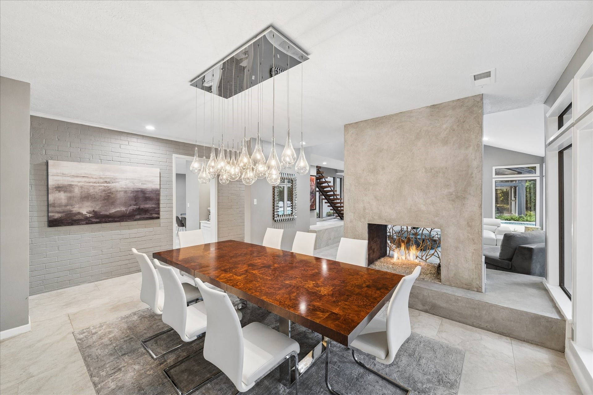 2411 Oakbank Drive, Kingwood, TX 77339 The space is open and bright, with neutral tones and contemporary decor, offering a seamless flow to the living area.
