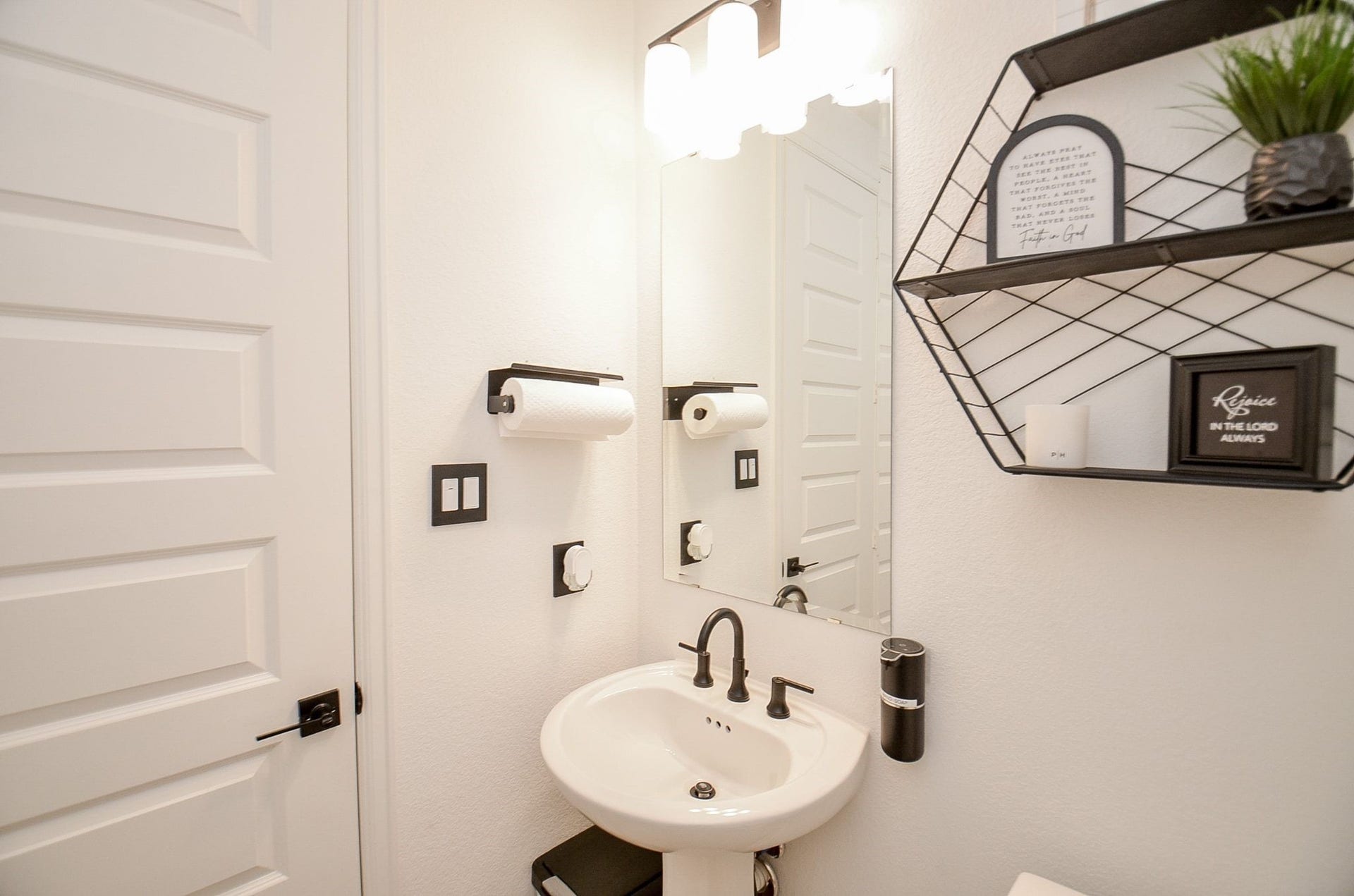 Charming powder room featuring modern fixtures and stylish finishes.
