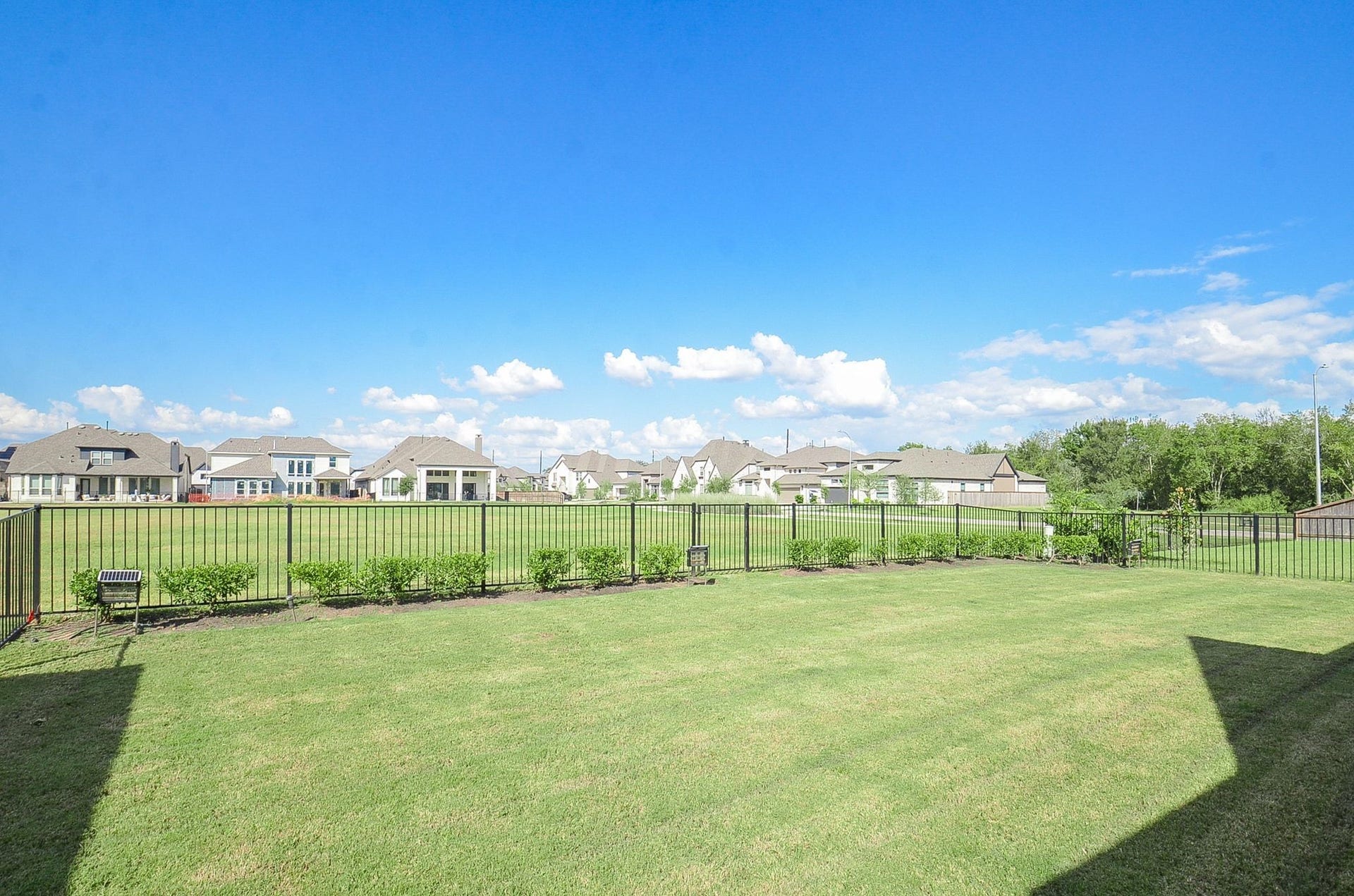 Enjoy unobstructed green-space views from the backyard with no immediate rear neighbors.