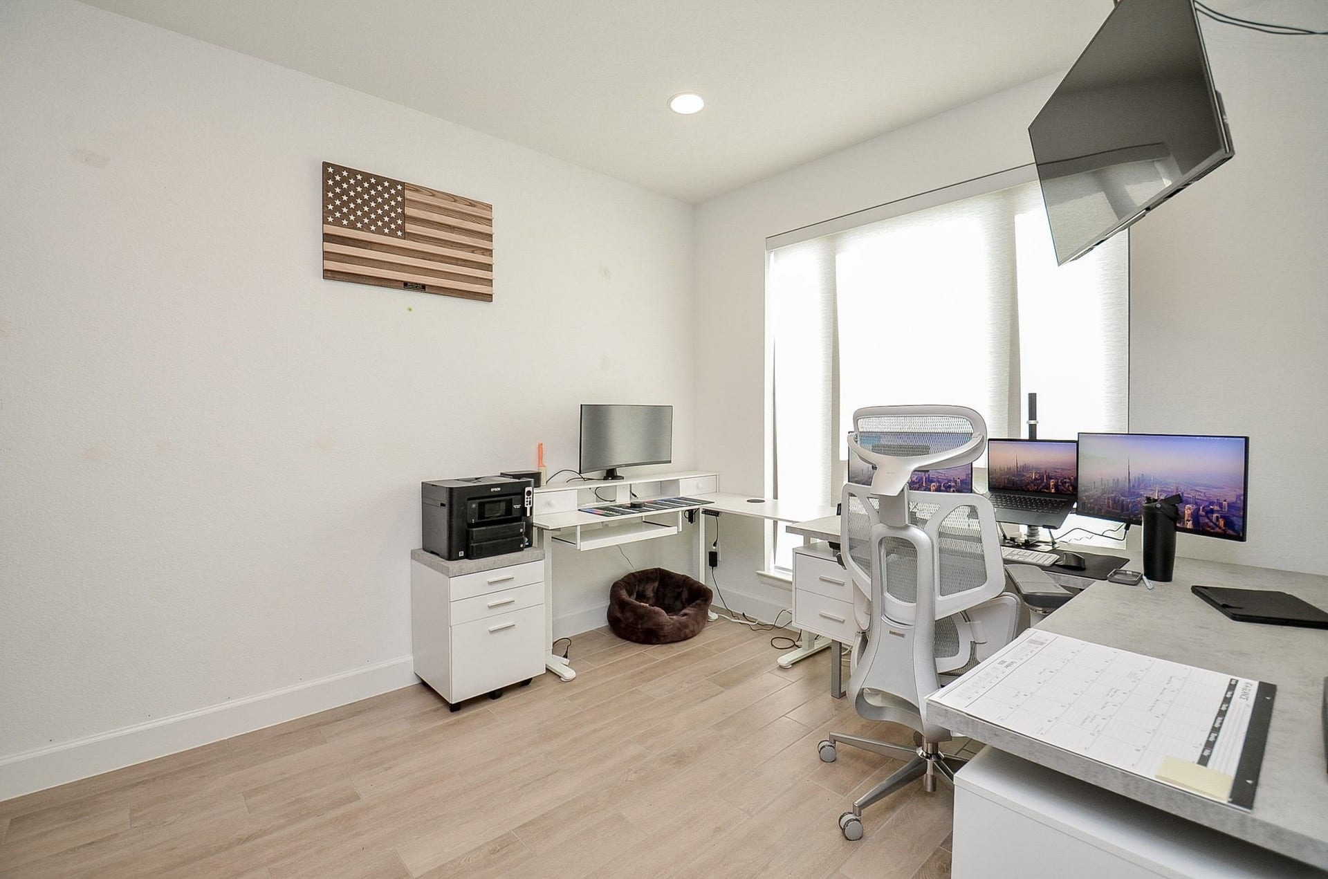 Another view of home office with natural light and plenty of room to work comfortably.