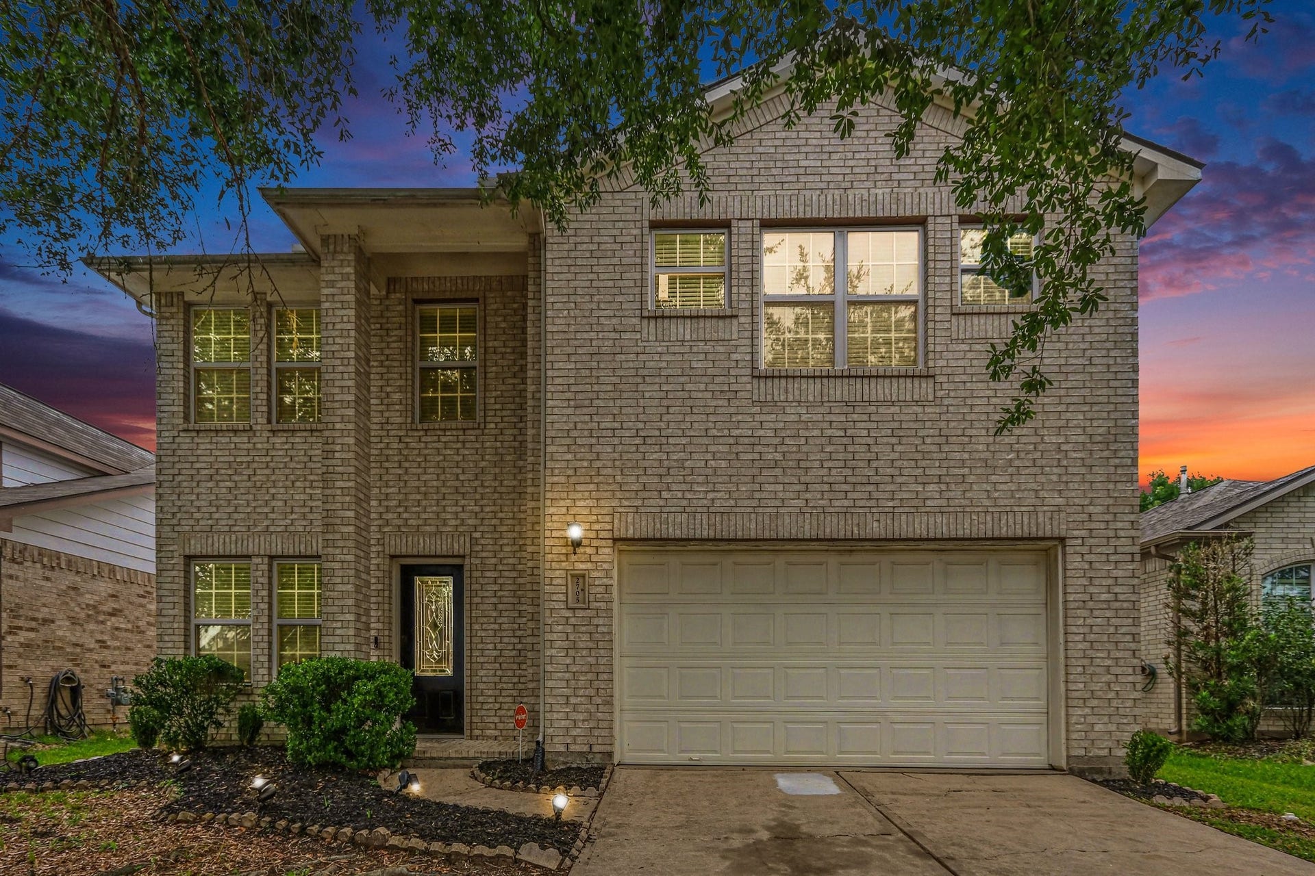 2705 Golden Creek Lane, Pearland, TX 77584 The home exudes warmth as the Texas sunsets in the night sky! And with recent updates to the roof and A/C units in 2022, you will be living in comfort too!