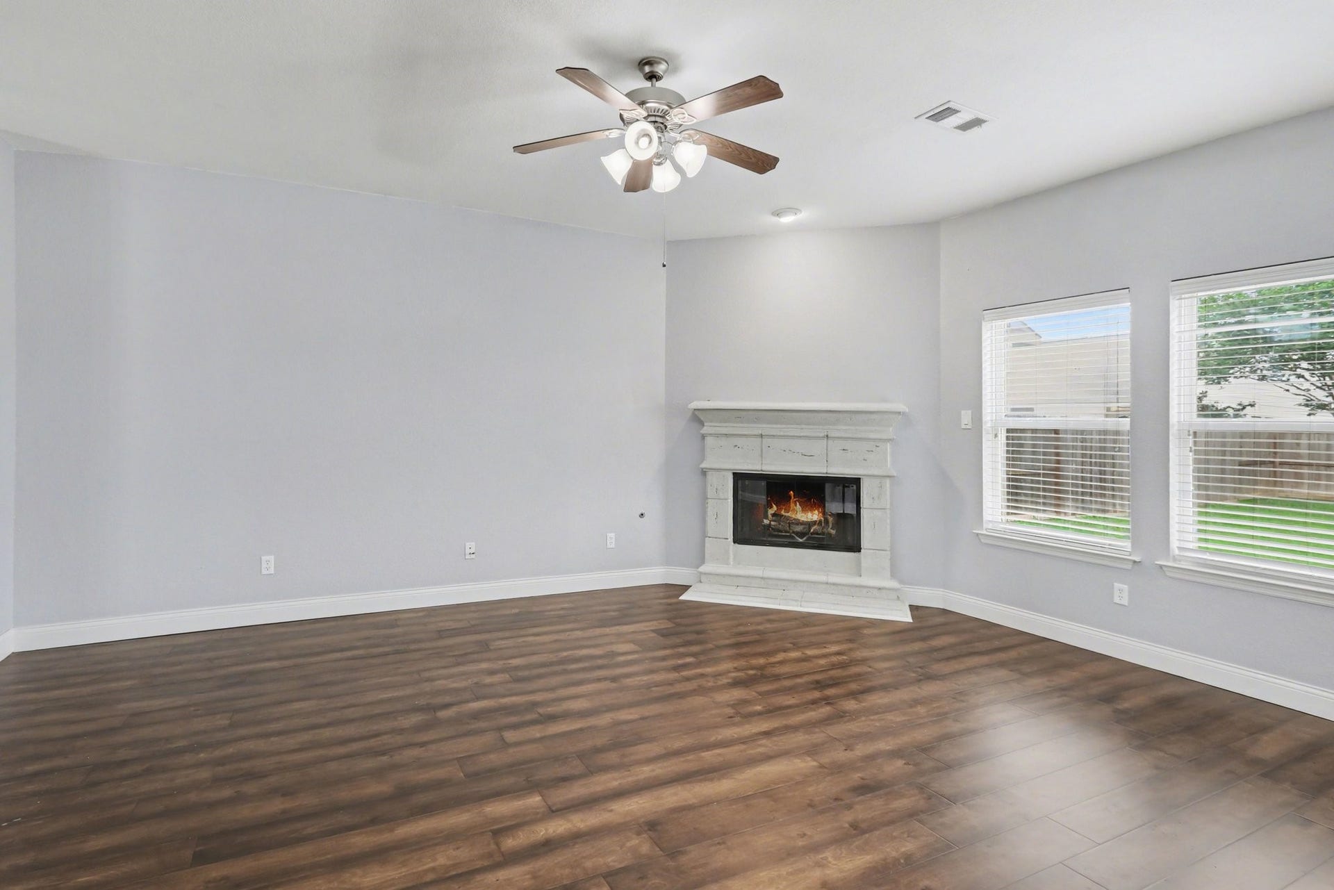 2705 Golden Creek Lane, Pearland, TX 77584 A cast-stone fireplace will surely warm the hearts of all that gather here! A recess light shines above the mantel for that perfect art piece!