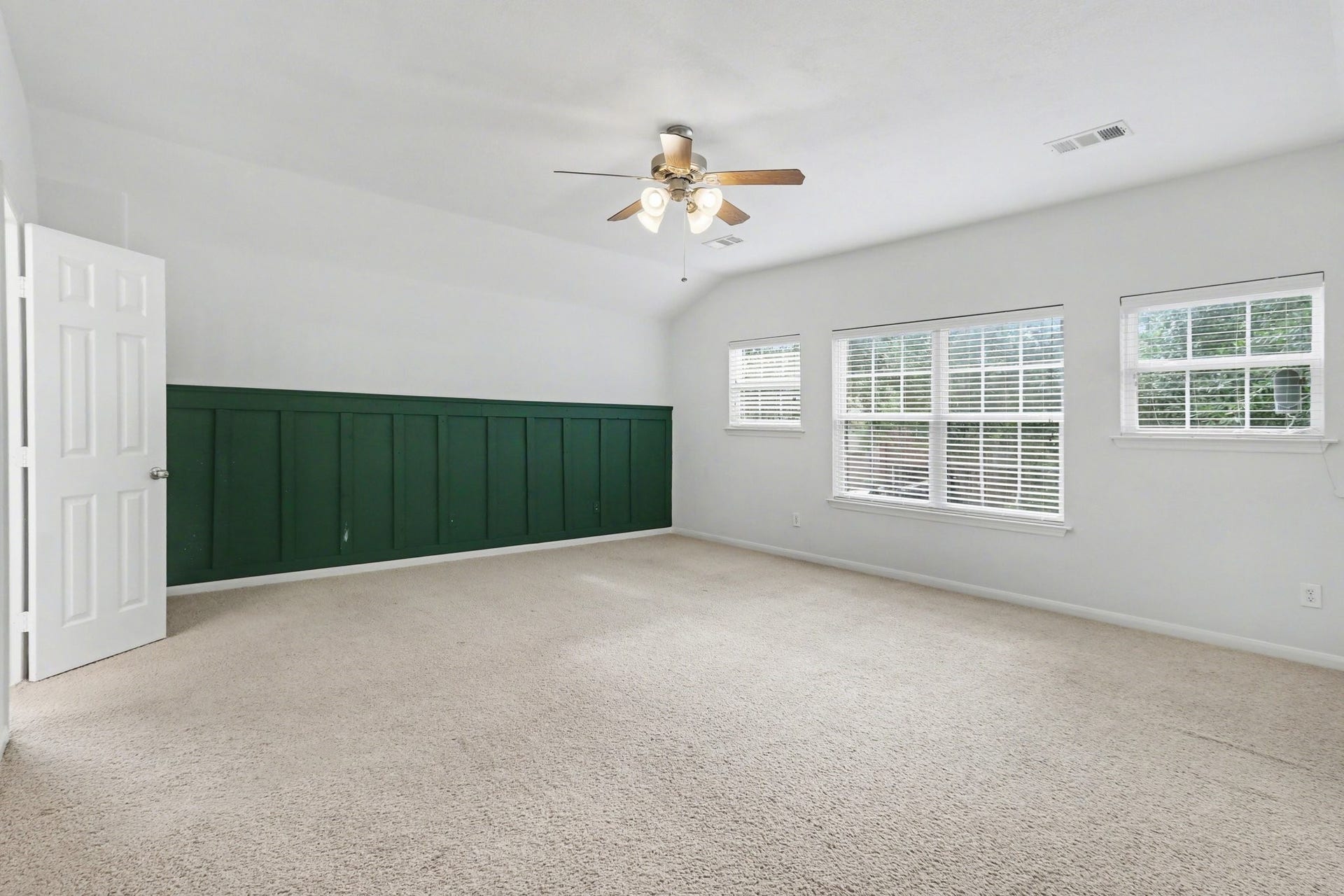 2705 Golden Creek Lane, Pearland, TX 77584 Welcome to the serene primary retreat, with a custom accent wall and a wall of windows allowing in tones of natural light!