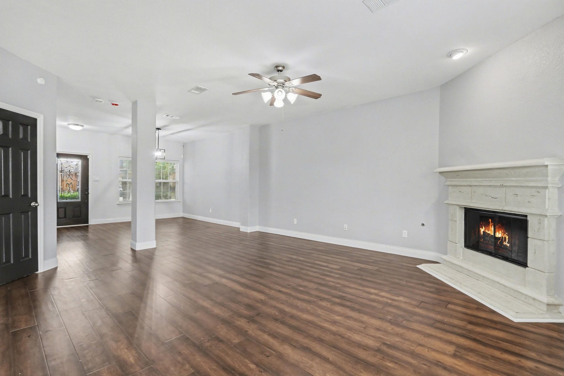 2705 Golden Creek Lane, Pearland, TX 77584 Open and inviting, this home features warm vinyl flooring, that flows throughout the main floor, creating a seamless look that is so easy to maintain!