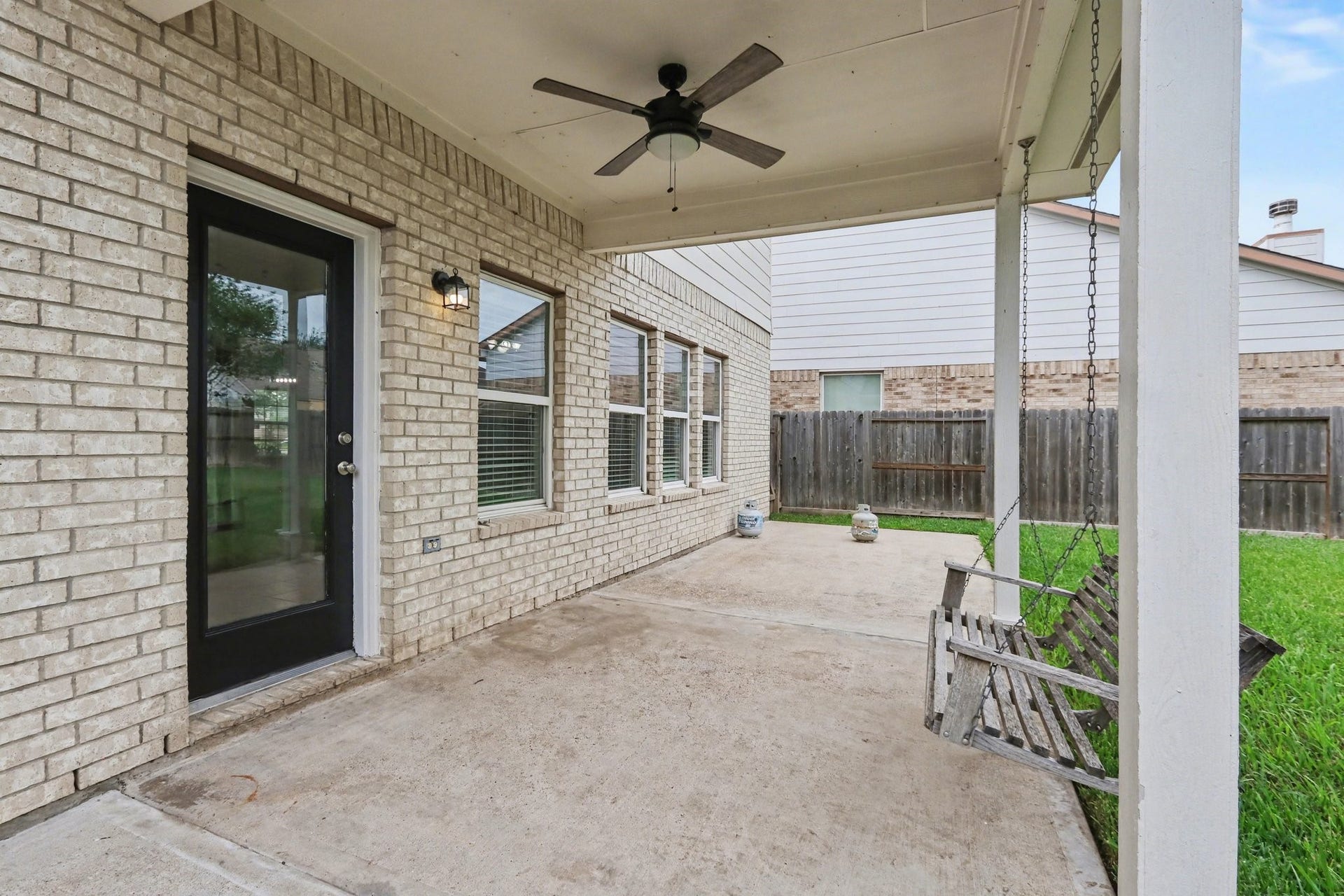 2705 Golden Creek Lane, Pearland, TX 77584 Step outside onto the covered patio, sit beneath the breezy fan and enjoy the great outdoors! There is even an uncovered area to soak in the rays, or set up an outdoor cooking space!