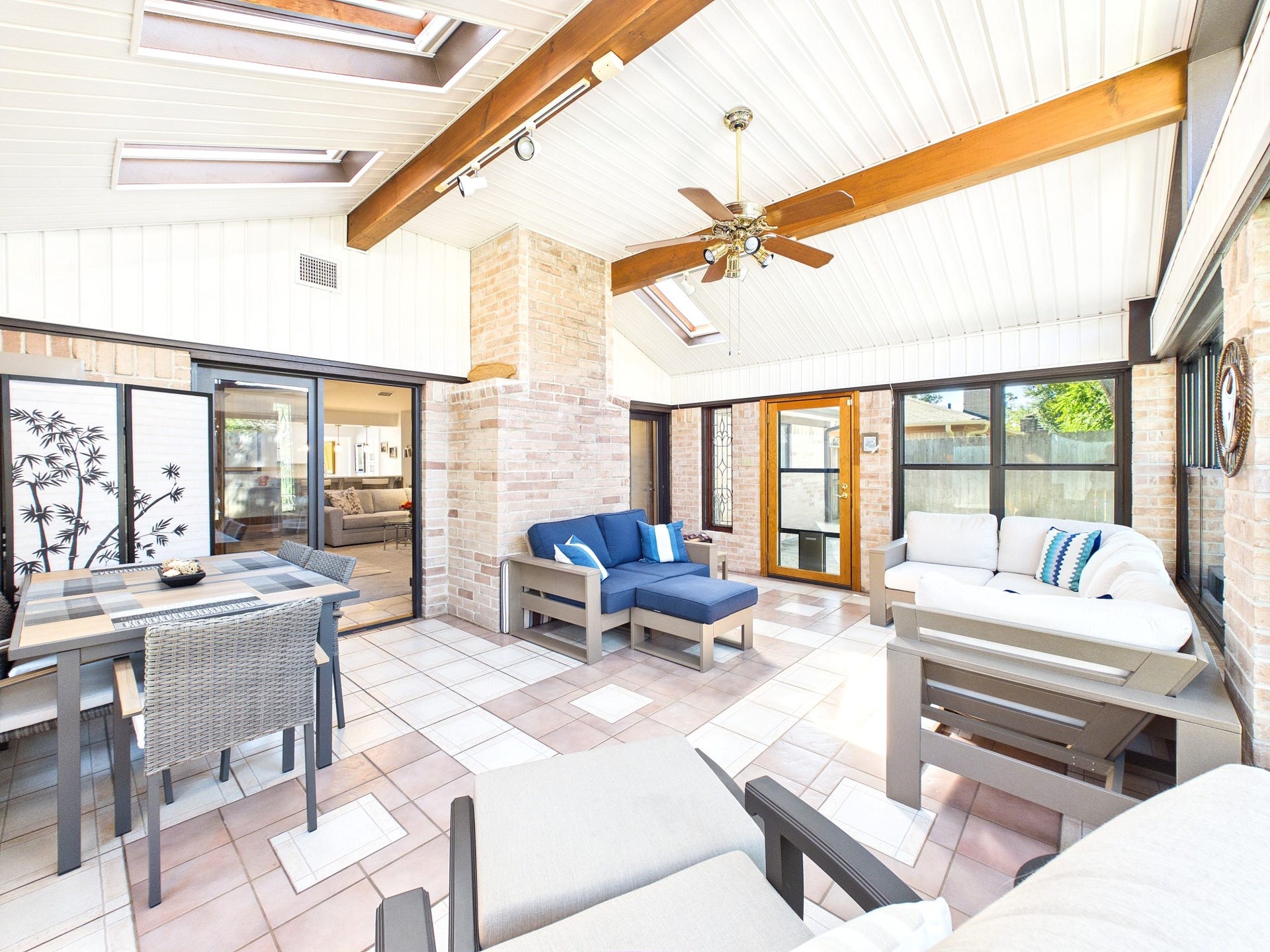 Experience year-round comfort in this bright and inviting all-season room, featuring ample natural light and cozy seating for relaxation and entertaining.