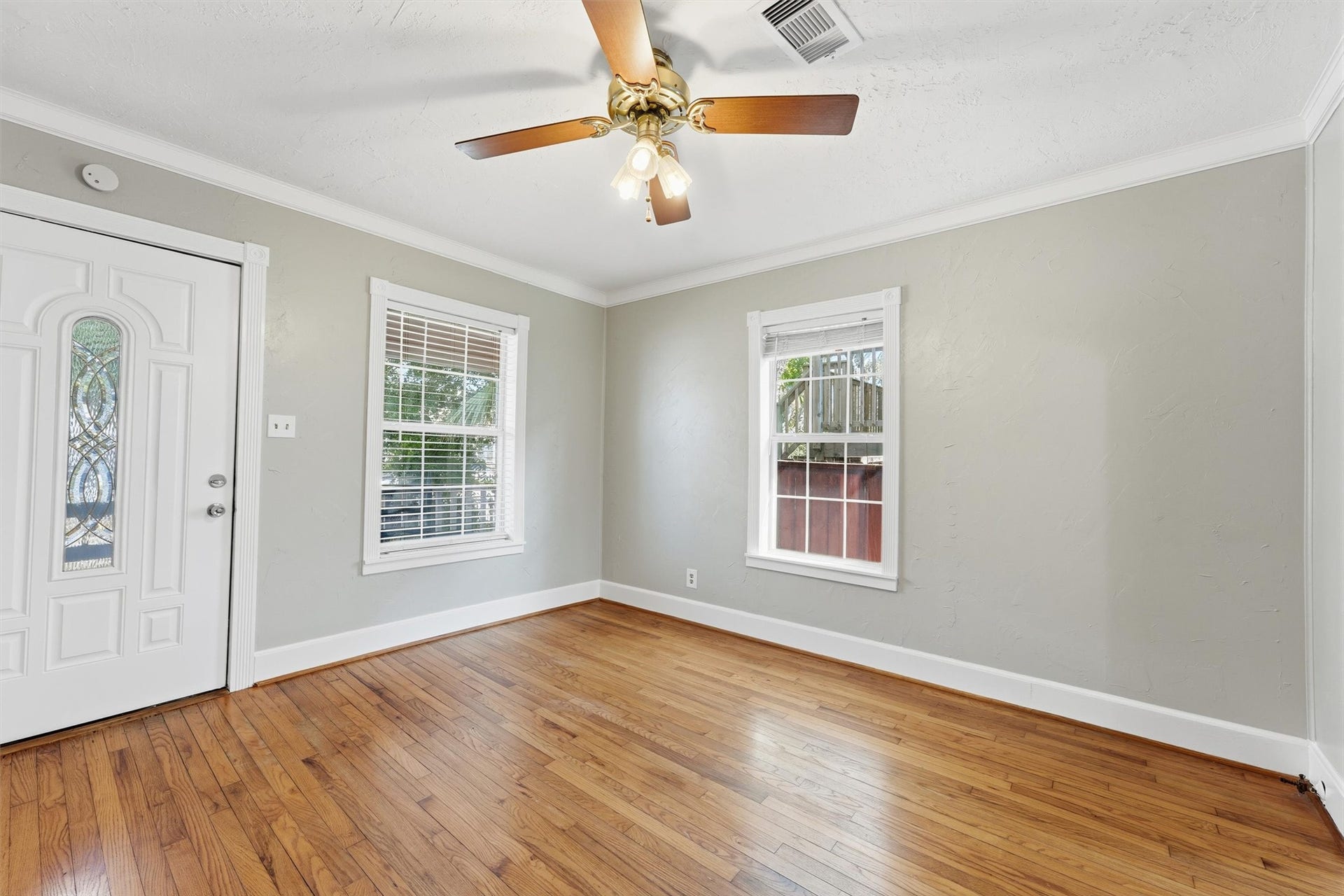 4823 Bernardo De Galvez, Galveston, TX 77551 Another view of living room not staged.