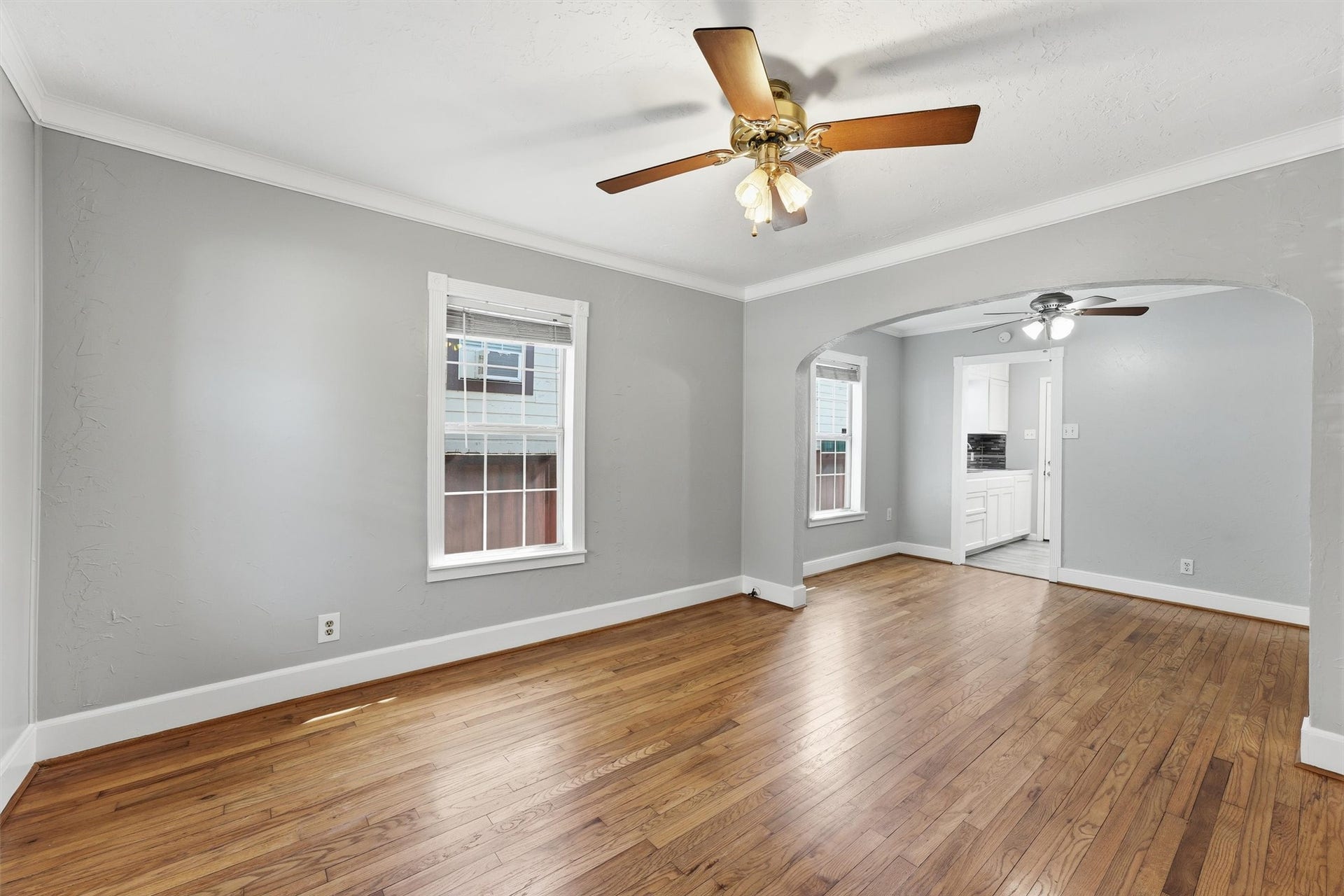 4823 Bernardo De Galvez, Galveston, TX 77551 Living room and dining area not staged.