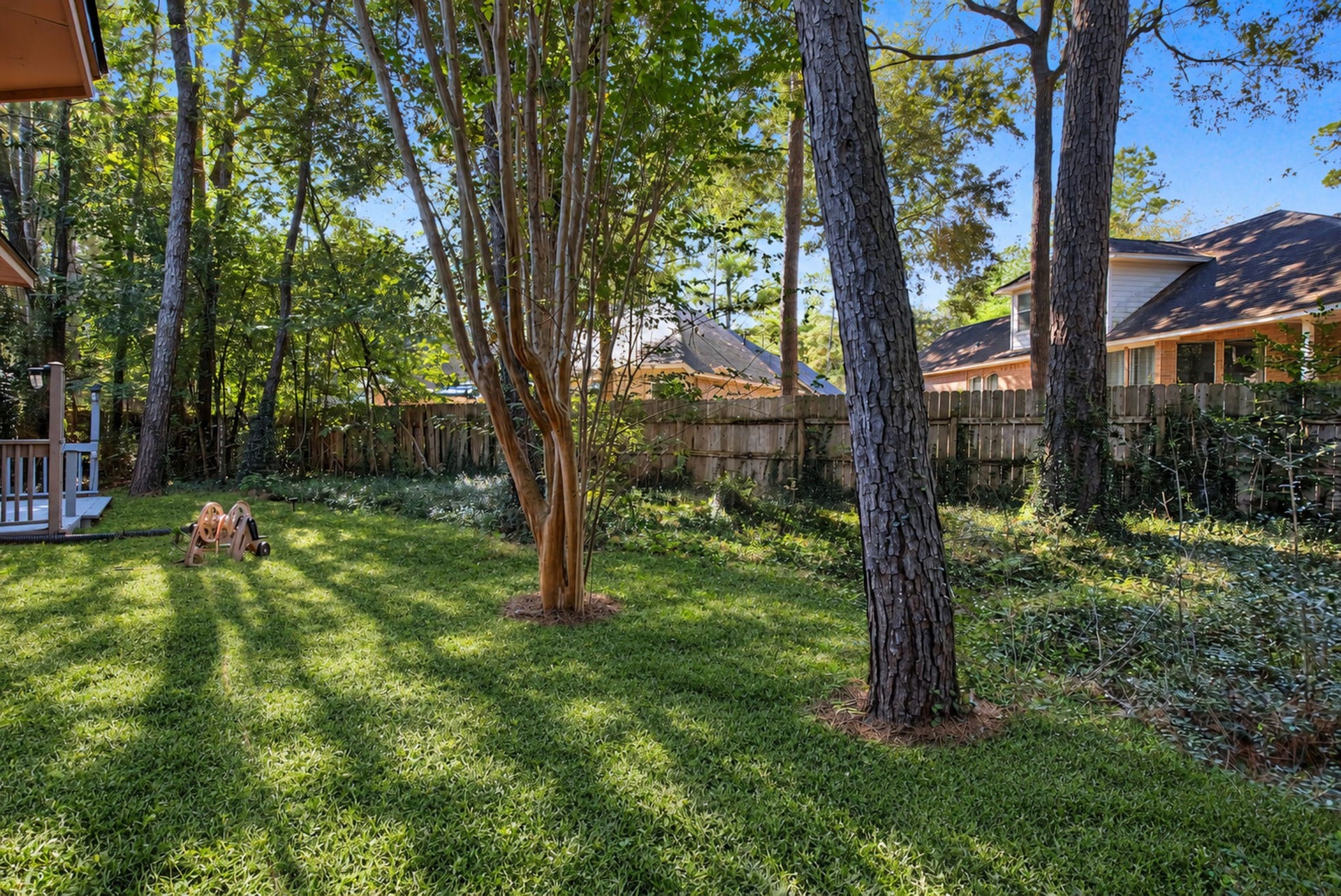 51 Pinery Ridge Place, The Woodlands, TX 77382 Reimagined backyard with new sod installed.