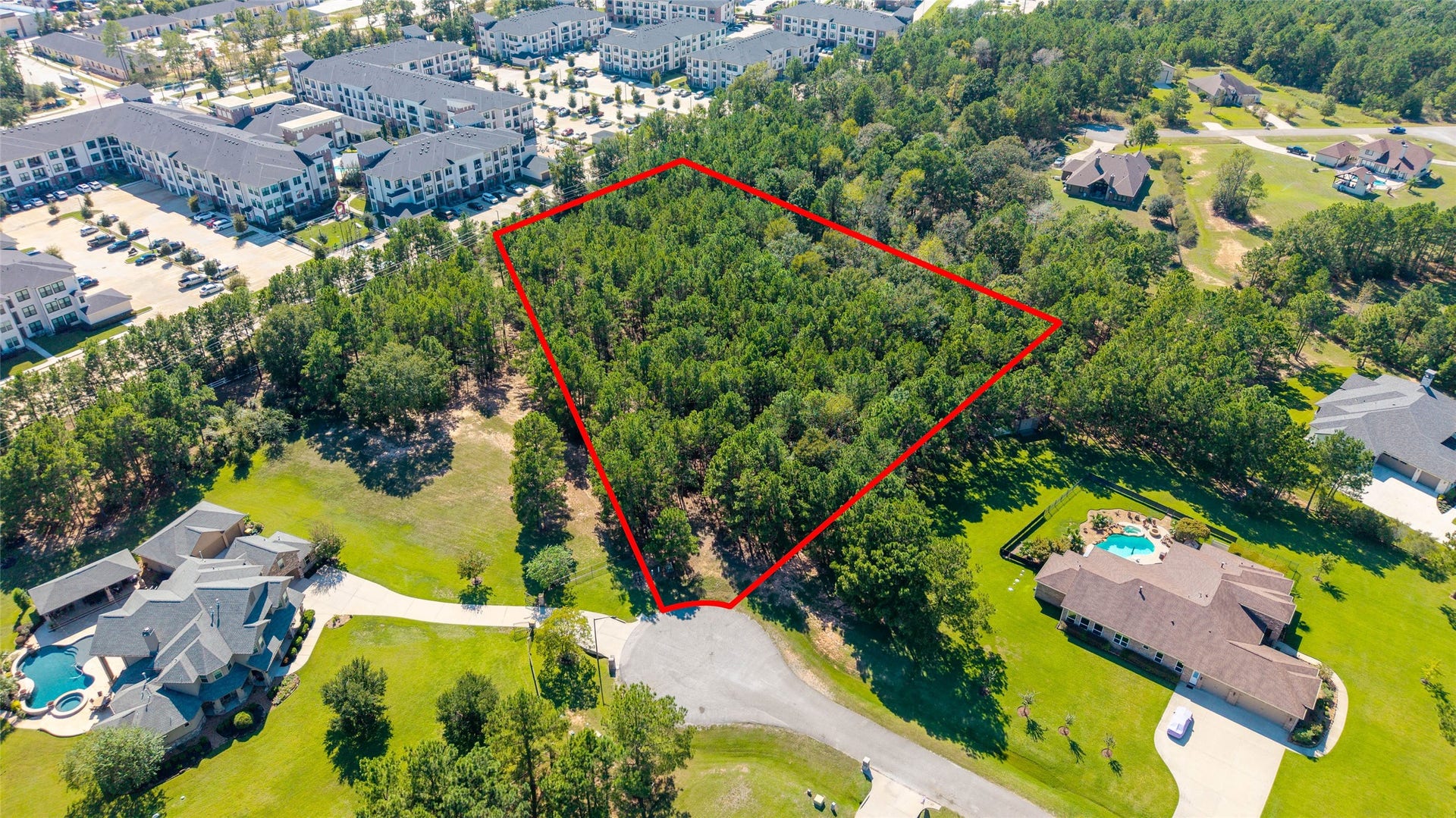 0 Ridgelake Court, Montgomery, TX 77316 Expansive wooded lot in a desirable neighborhood, offering privacy and proximity to modern amenities, perfect for building your dream home.