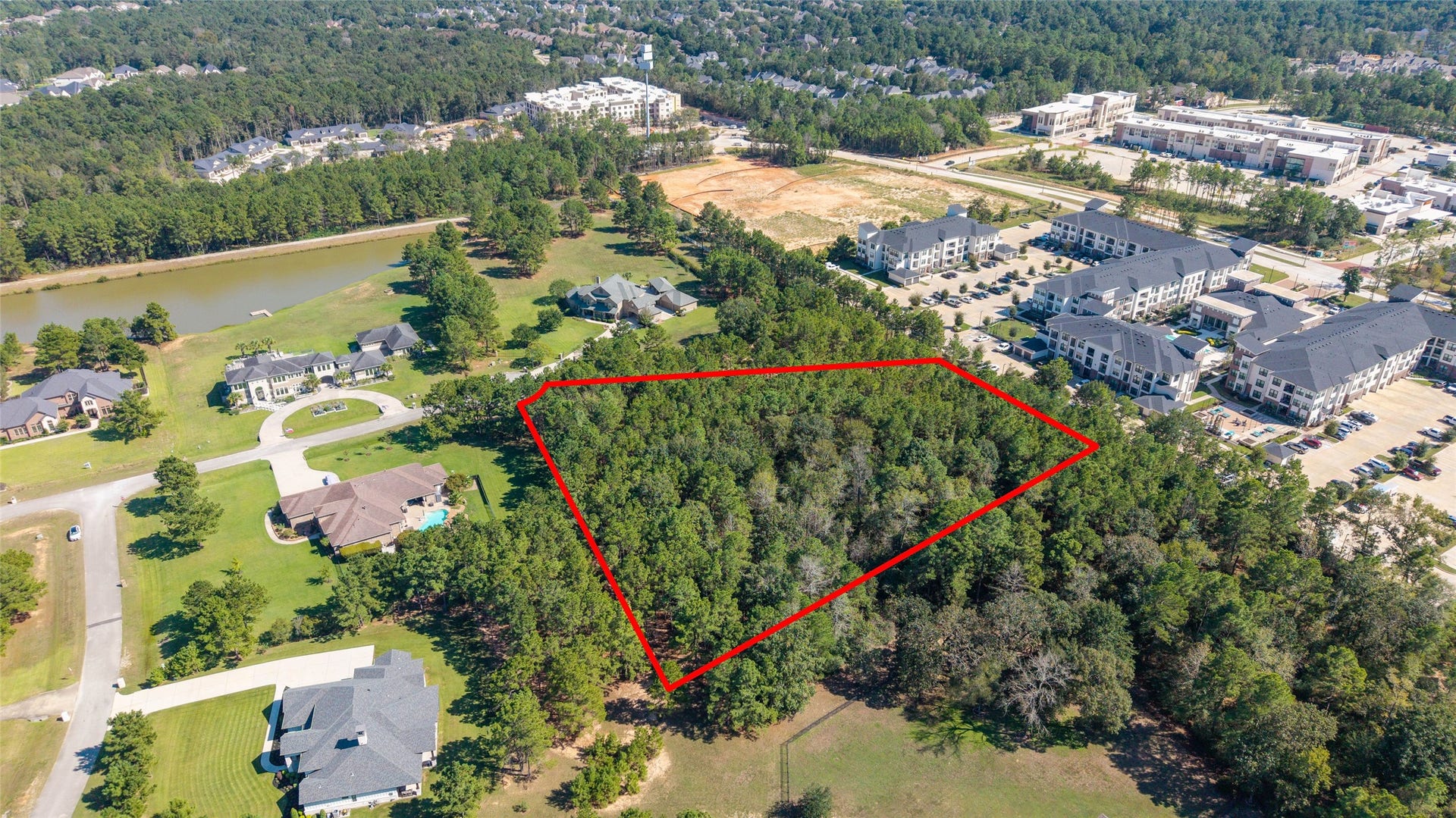 0 Ridgelake Court, Montgomery, TX 77316 Expansive wooded lot nestled in a serene neighborhood, offering privacy and proximity to modern amenities, ideal for building your dream home.