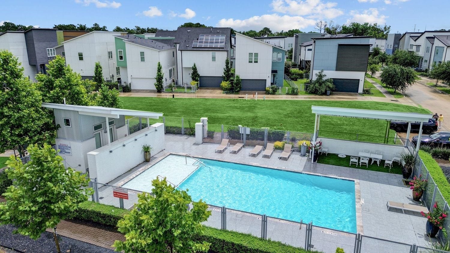 9820 Mocking Bird Hill Lane, Houston, TX 77080 Enjoy modern living with very close by access to a stylish community pool, perfect for relaxation and social gatherings.