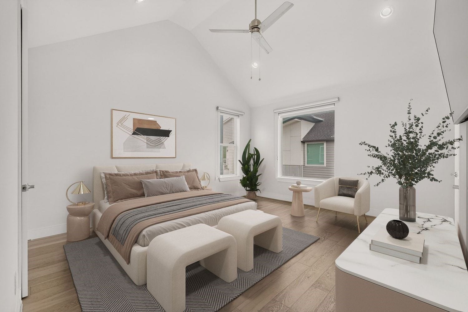 9820 Mocking Bird Hill Lane, Houston, TX 77080 Spacious Primary bedroom with vaulted ceilings, modern decor, and abundant natural light from large windows, offering a serene retreat.