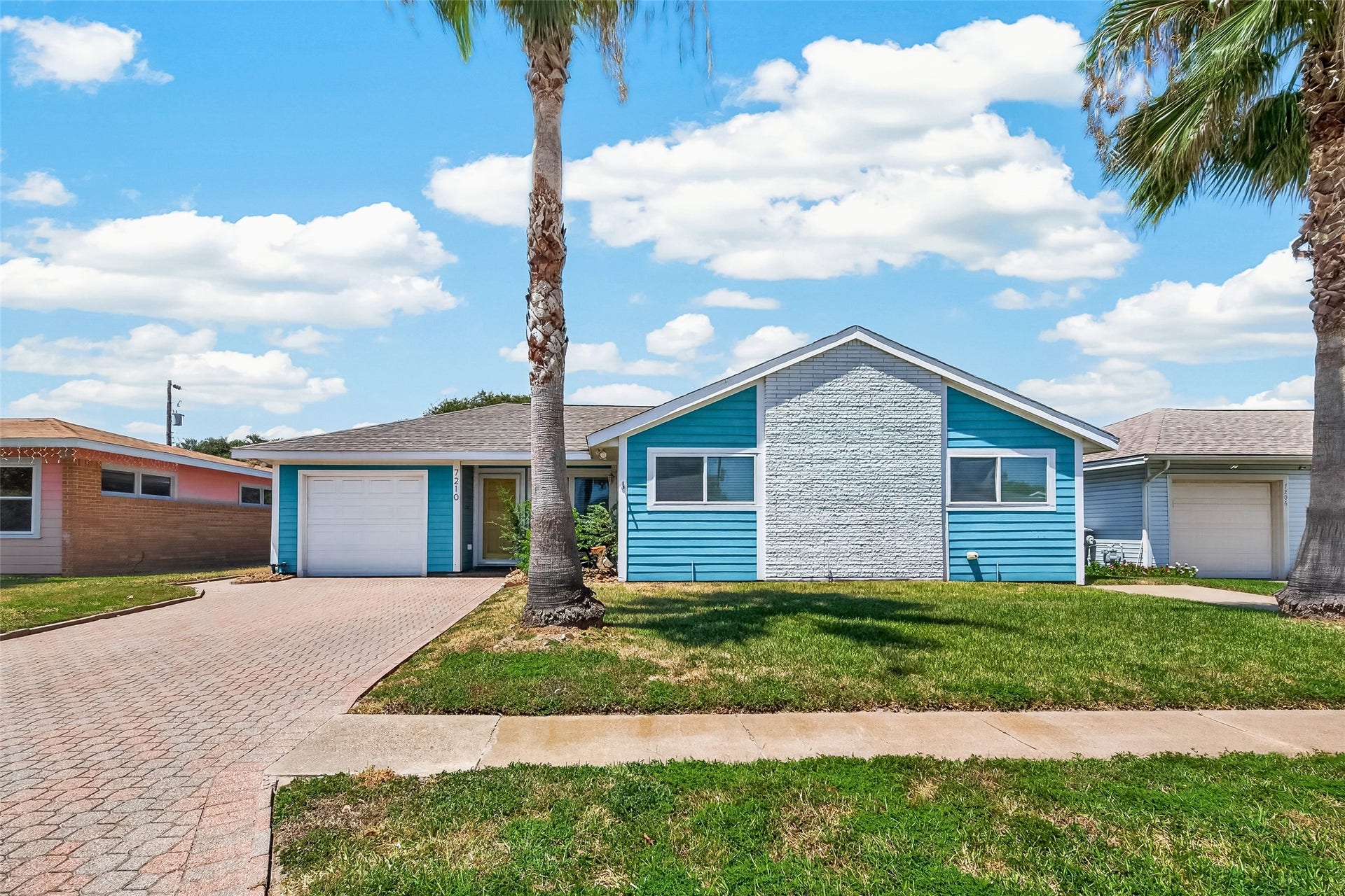 7210 Yucca Drive, Galveston, TX 77551 Welcome home! Overside drive way and garage offer ample off street parking