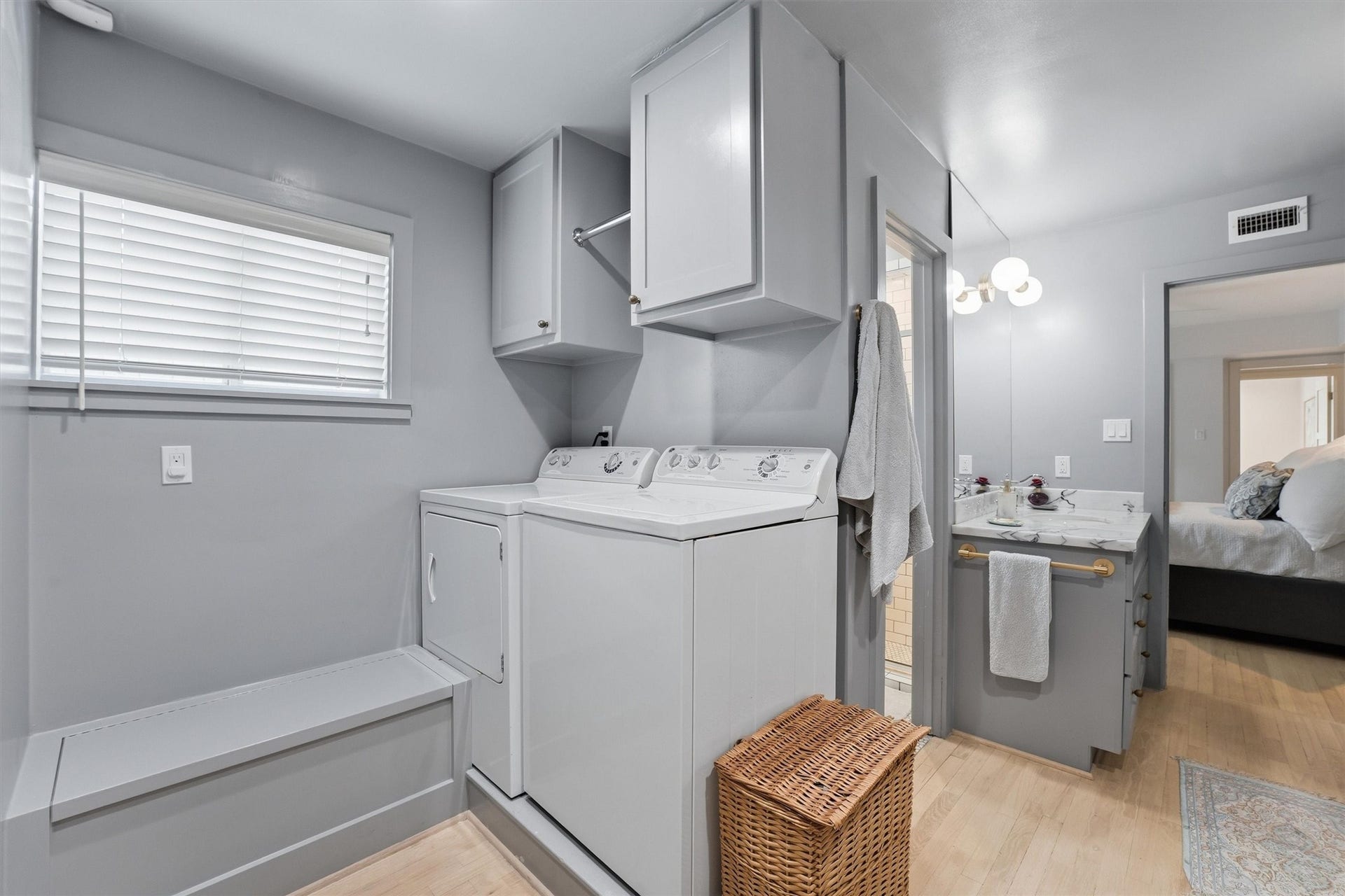 1006 Prince Street, Houston, TX 77008 Primary bath, vanity, closet and laundry are all together - accessible only through the primary bedroom.